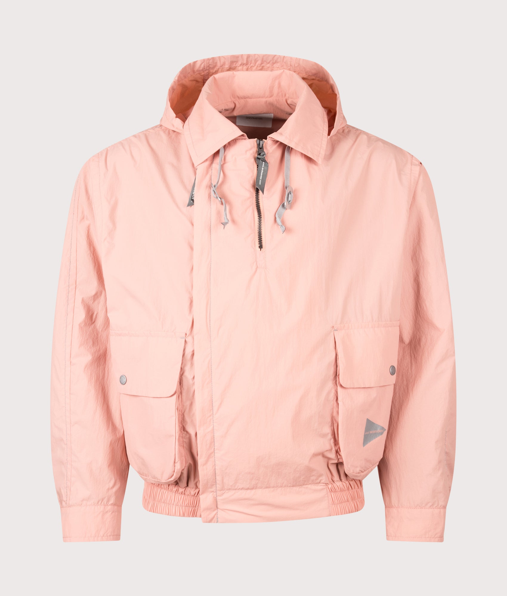 and wander Water Repellent Light Jacket 2 in Pink at EQVVS Menswear. Front shot.