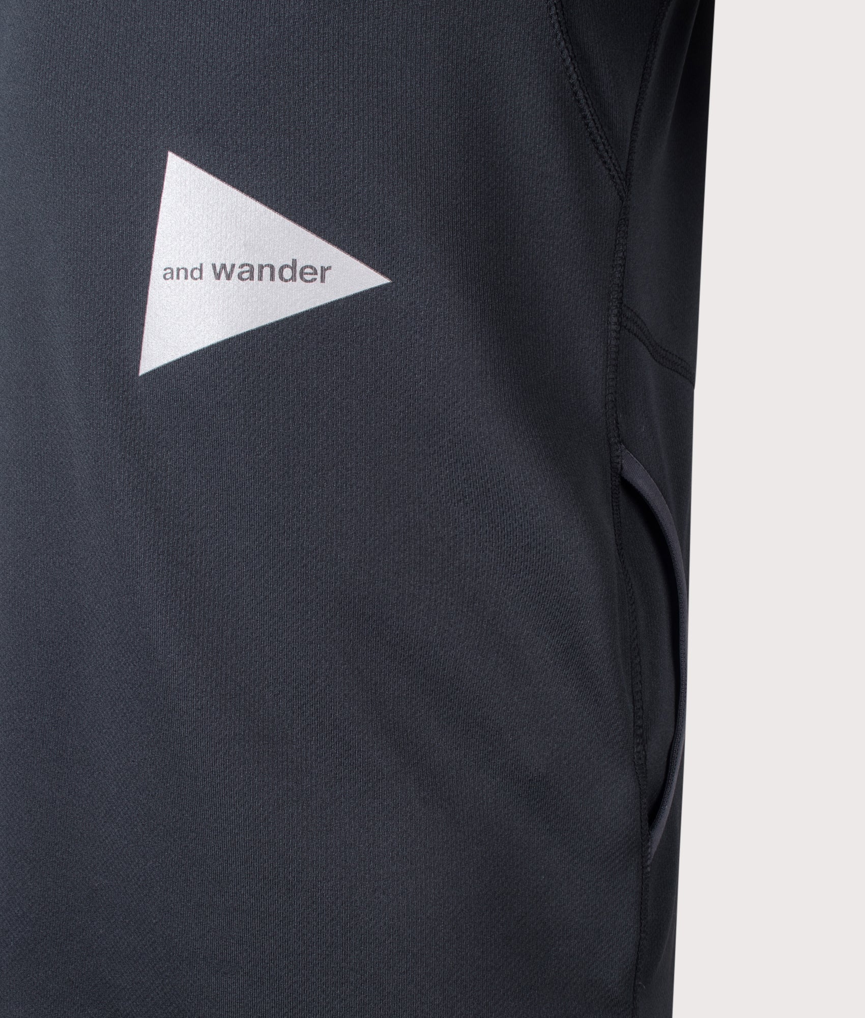 Dry Jersey Raglan T-Shirt in Black by and wander. Shot by EQVVS. Detail shot.