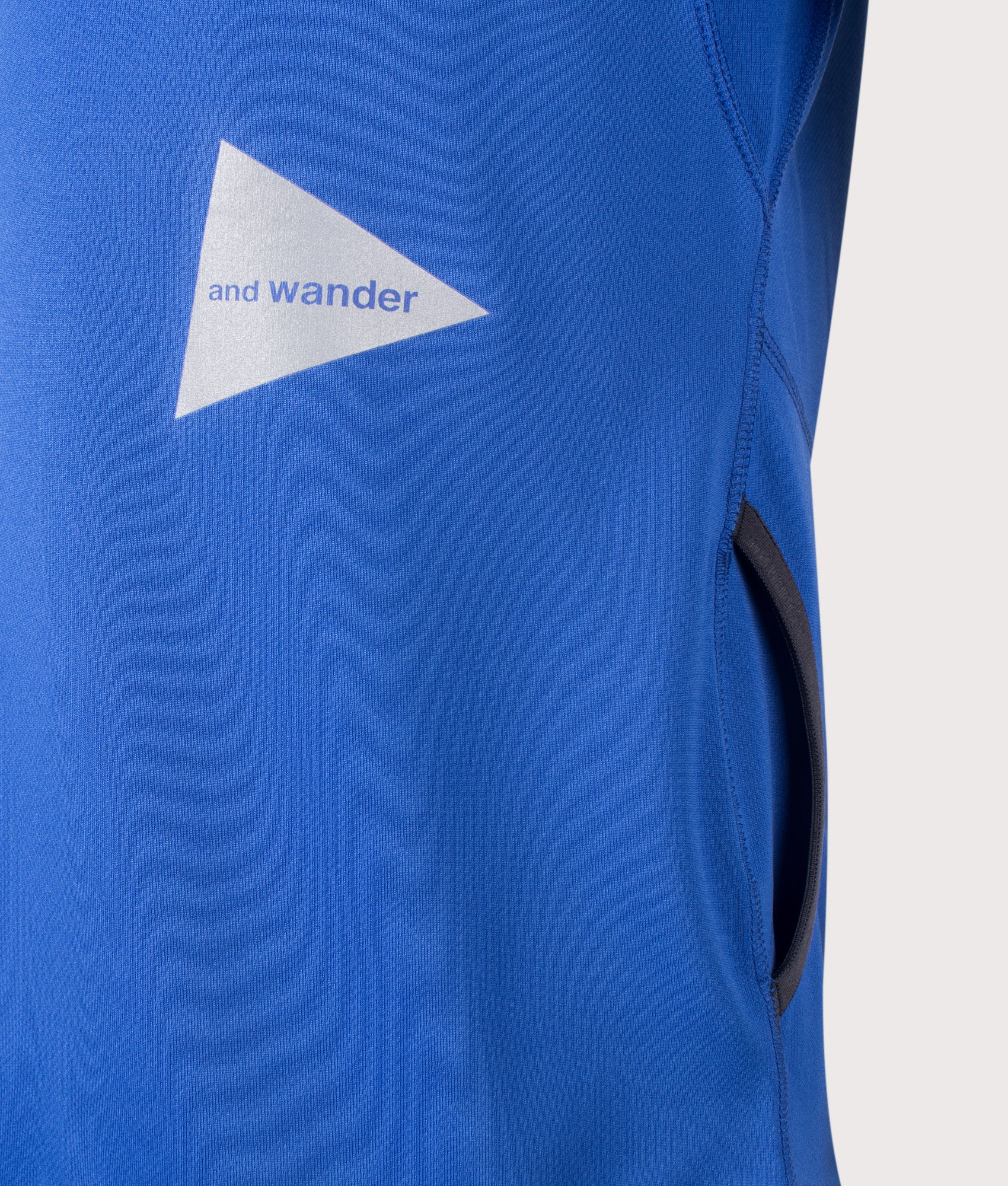 and wander Dry Jersey Raglan T-Shirt in Blue at EQVVS Menswear. Detail shot.