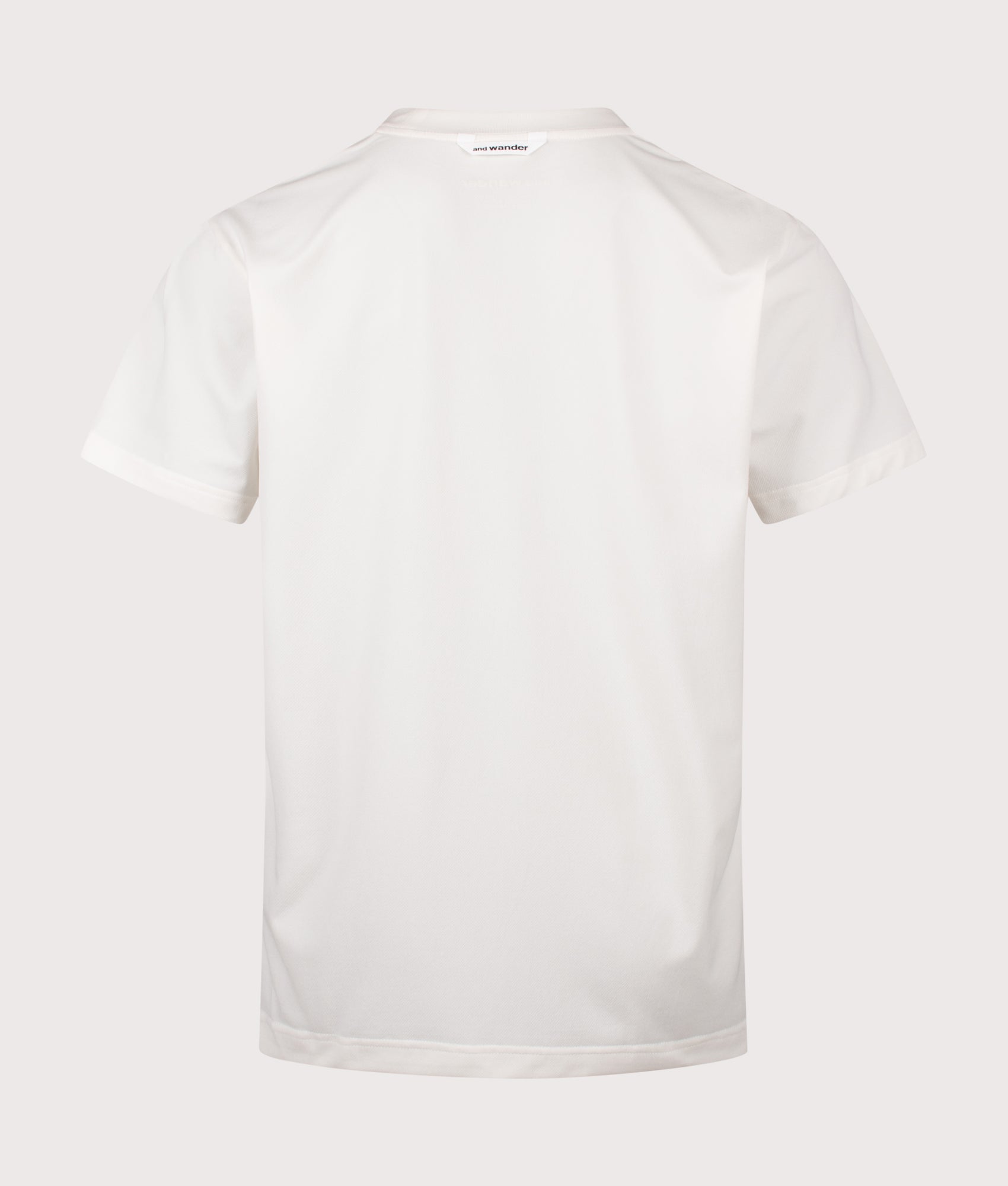and wander Dry Mesh T-Shirt in Off White at EQVVS Menswear. Back shot.