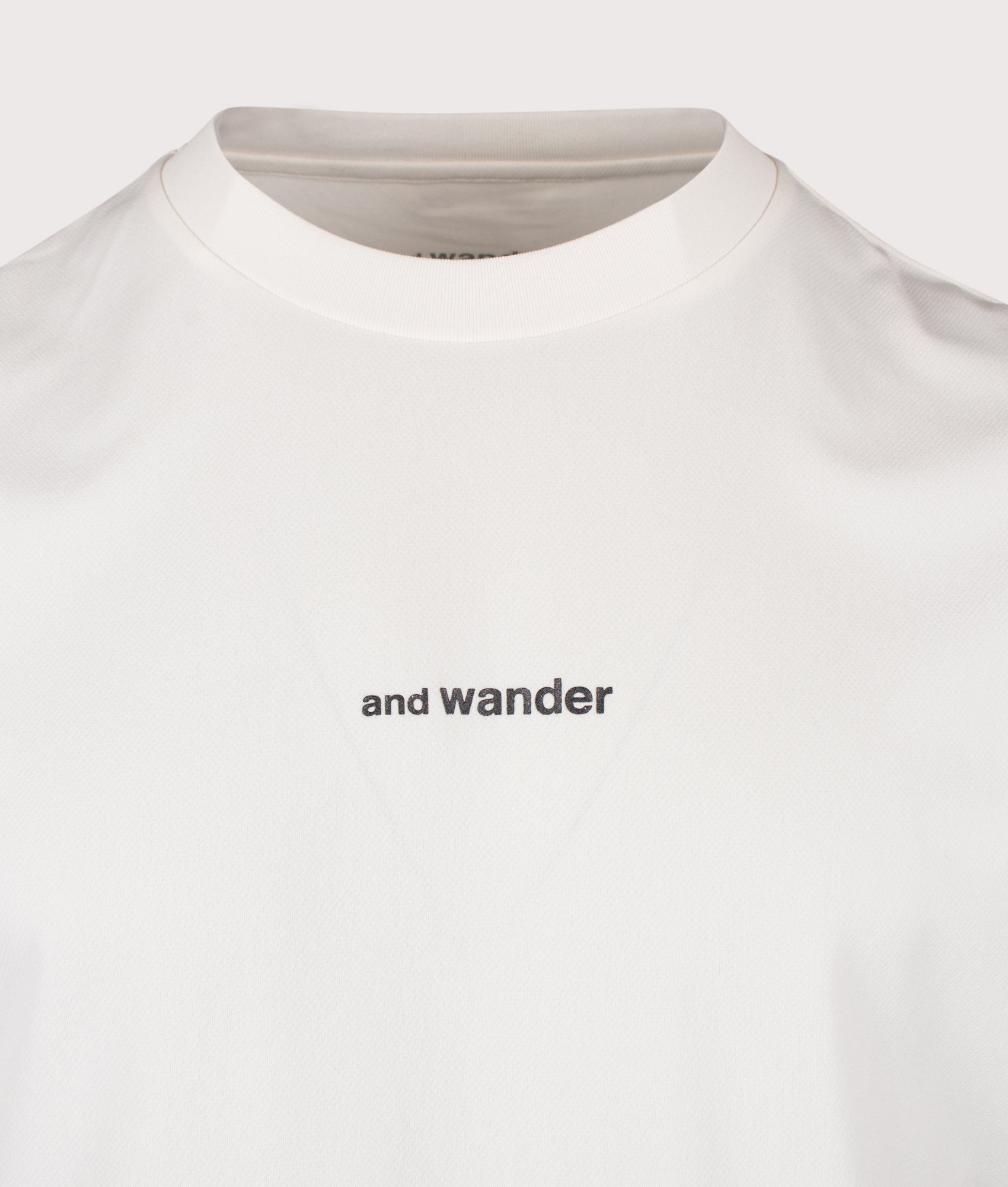 and wander Dry Mesh T-Shirt in Off White at EQVVS Menswear. Detail shot.