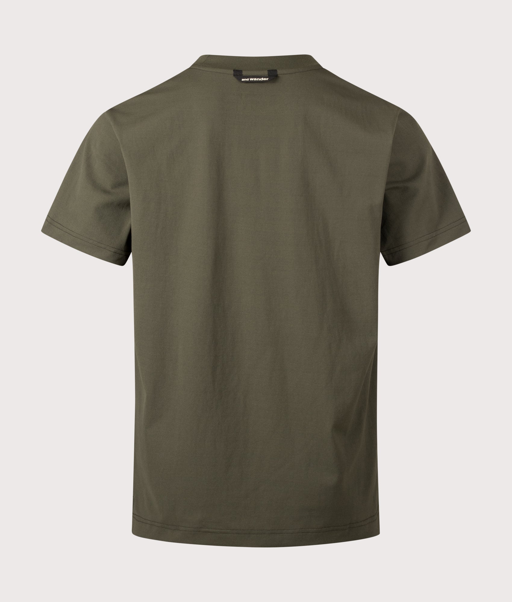 and wander Dry Mesh T-Shirt in Dark Khaki at EQVVS Menswear. Back shot.