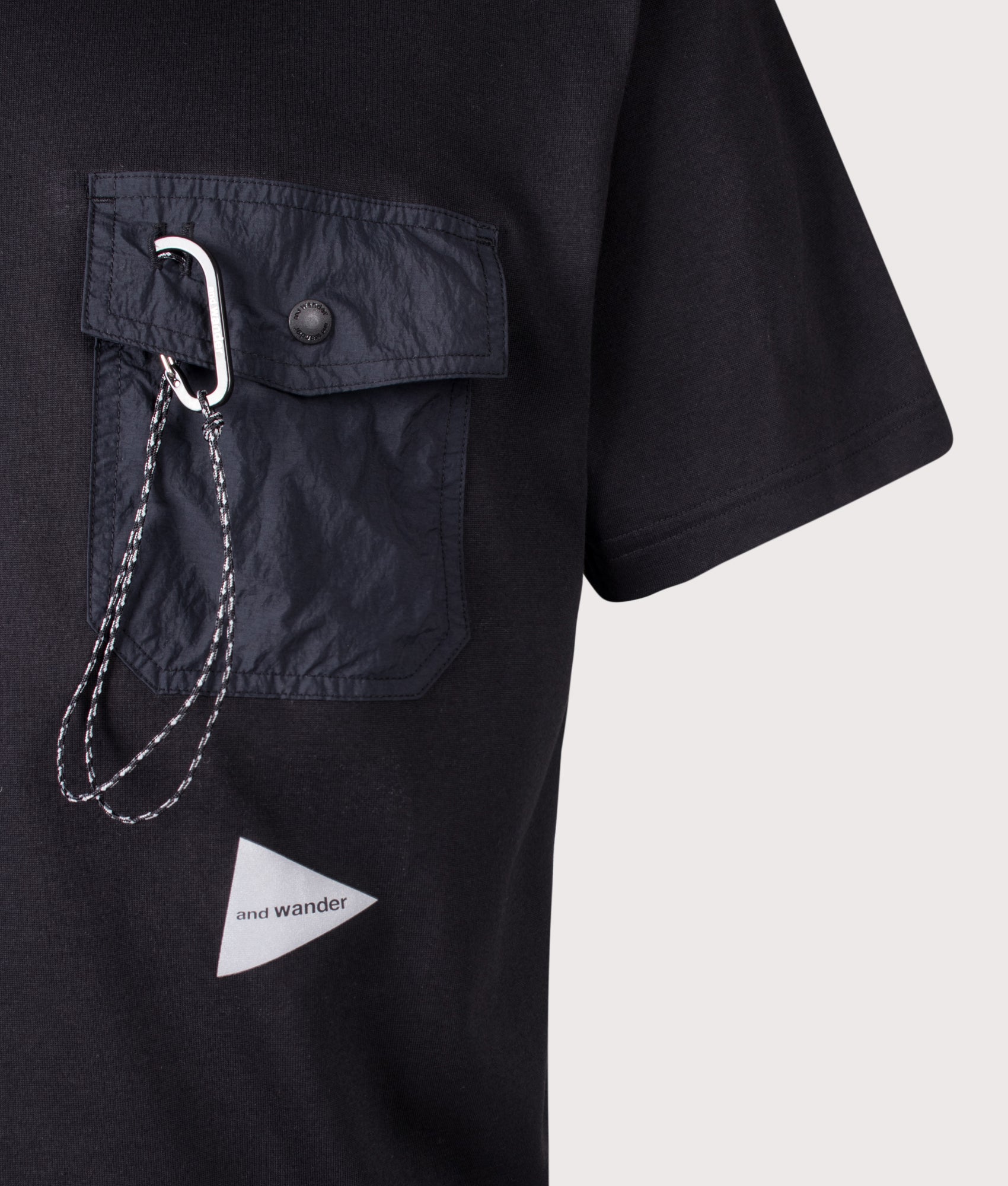 Pocket T-Shirt in Black by and wander. Shot by EQVVS. Detail shot.