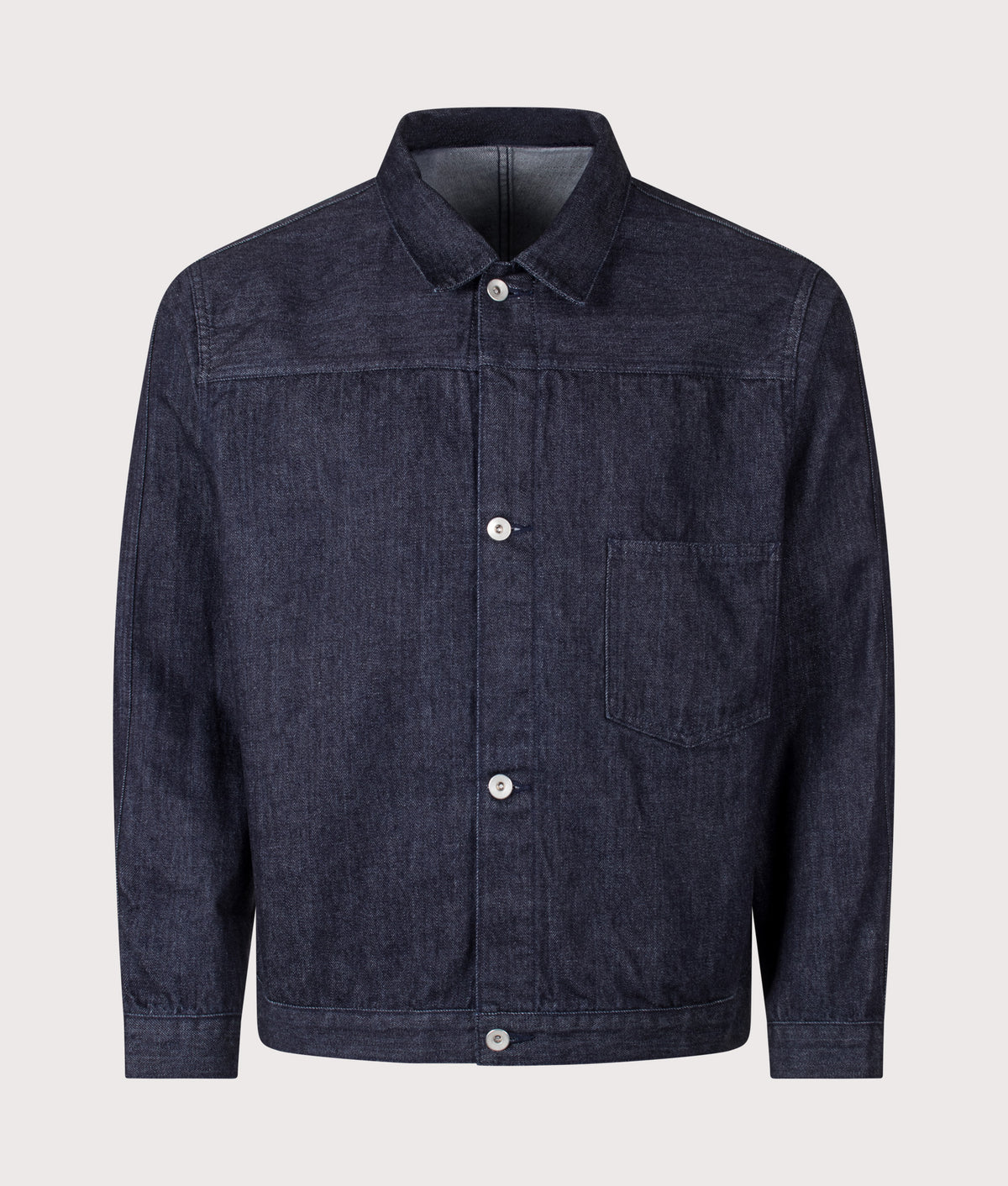nanamica Relaxed Fit Short Denim Jacket in Indigo at EQVVS Menswear. Front shot.