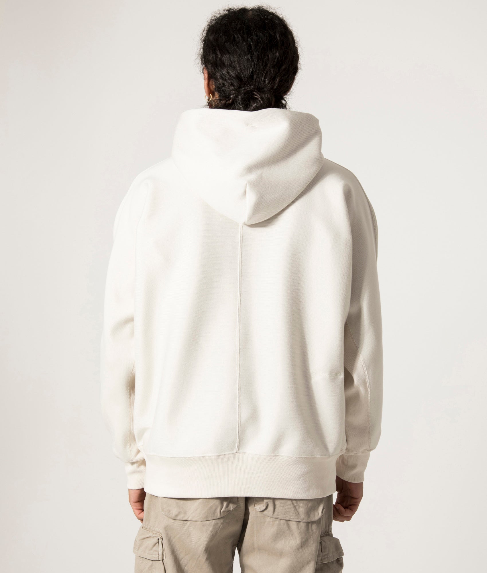 nanamica Hooded Pullover Sweat in Ivory at EQVVS. Model Back Shot.