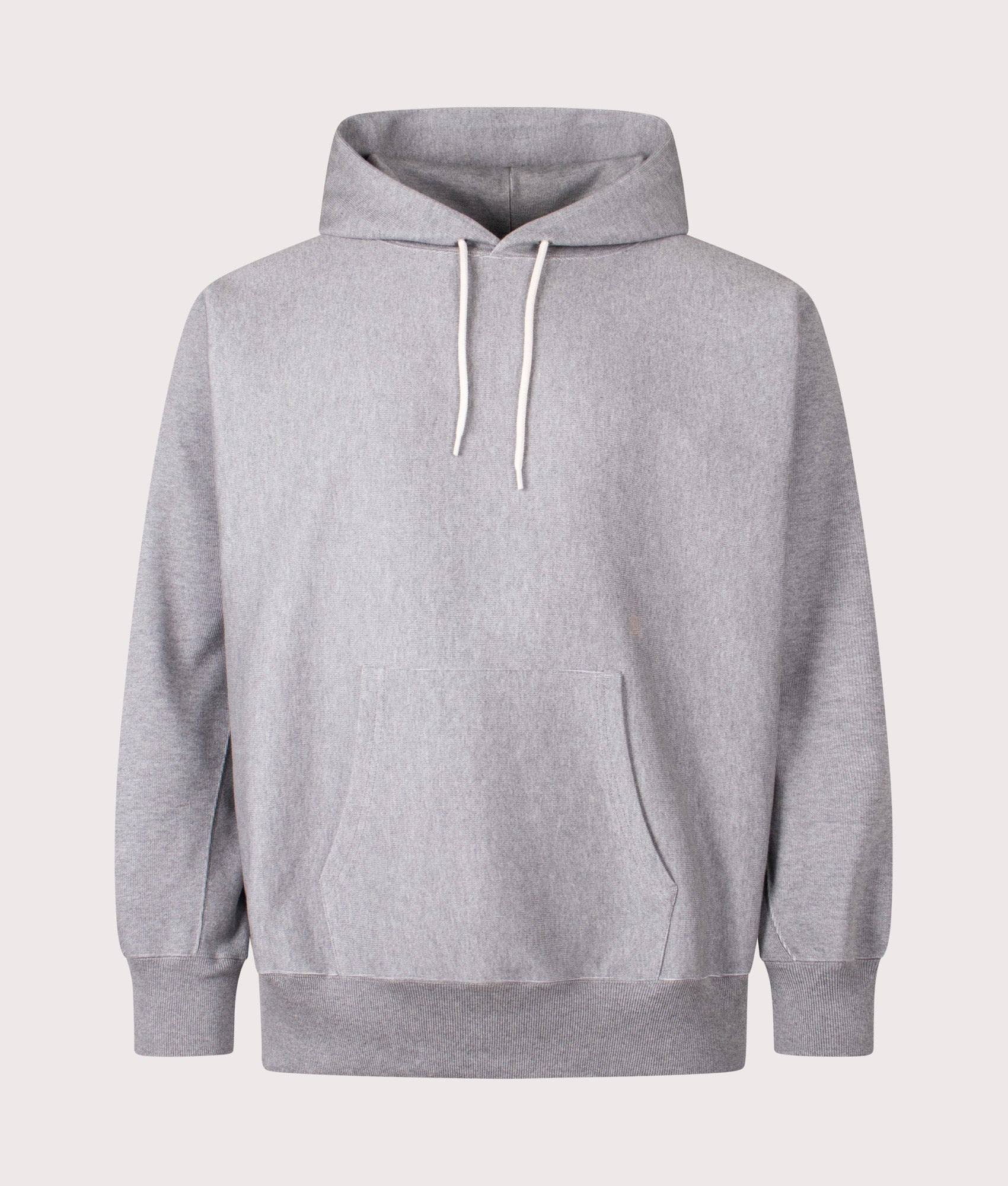 Nanamica Pullover sweat hoodie in Heather Grey at EQVVS Menswear. Front shot.