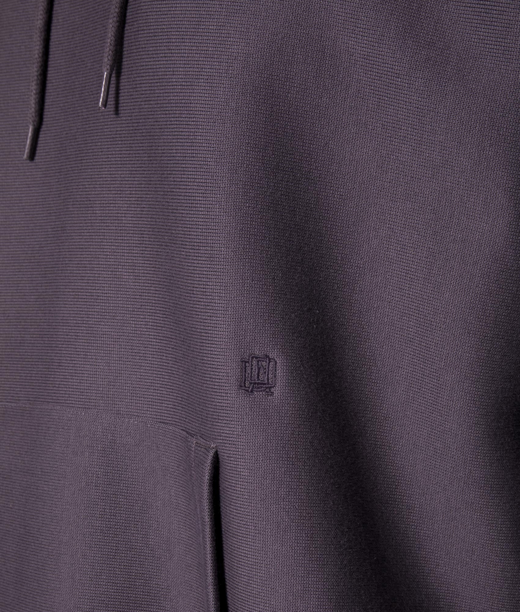 nanamica Hooded Pullover Sweat in Vintage Navy at EQVVS. Pocket detail Shot.