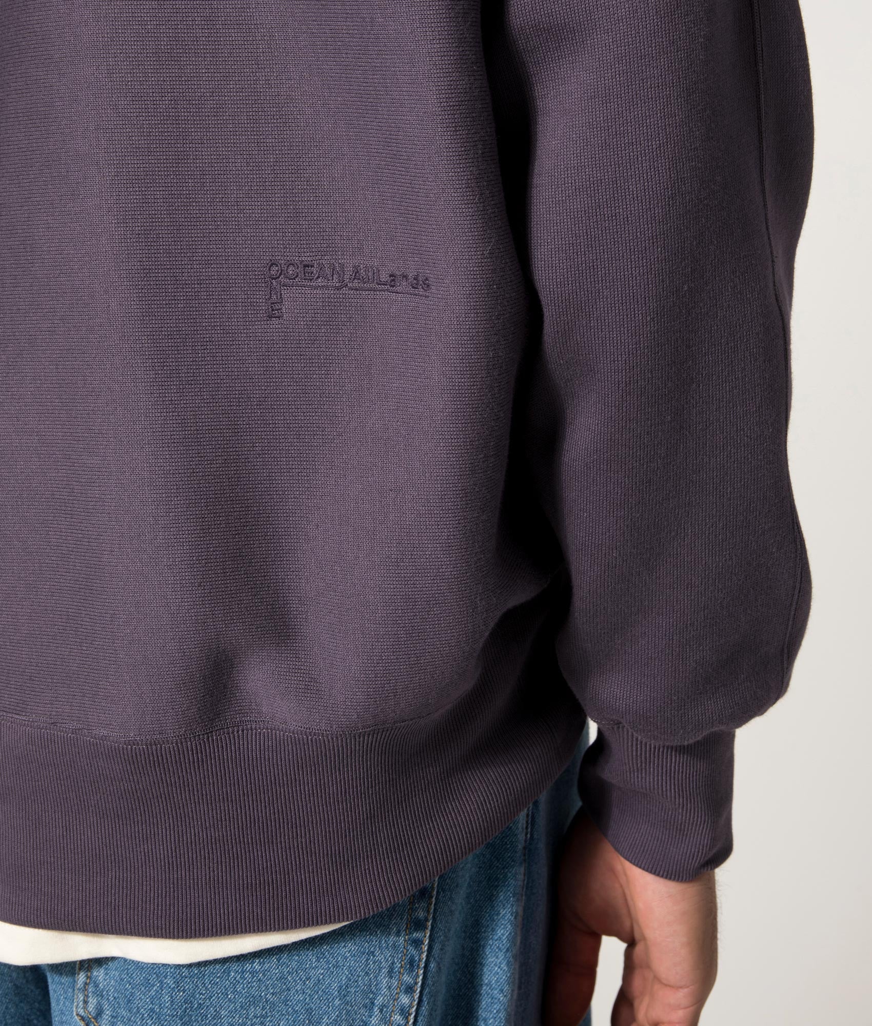 nanamica Hooded Pullover Sweat in Vintage Navy at EQVVS. Model Back Detail Shot.