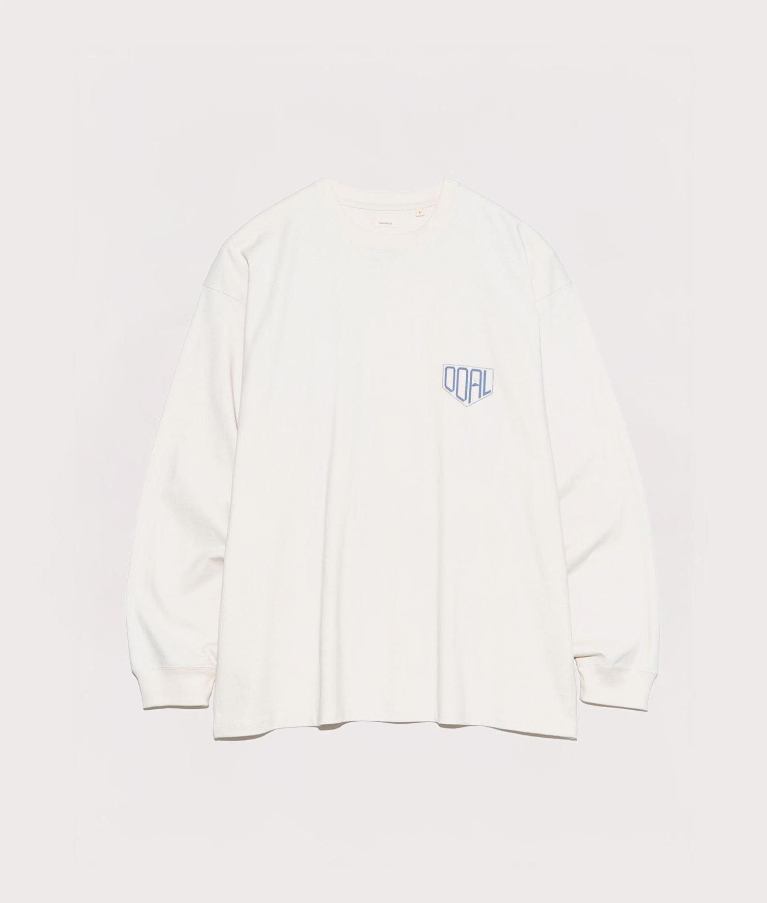 nanamica OOAL Long Sleeve Graphic T-Shirt in Ivory at EQVVS. Front Shot.