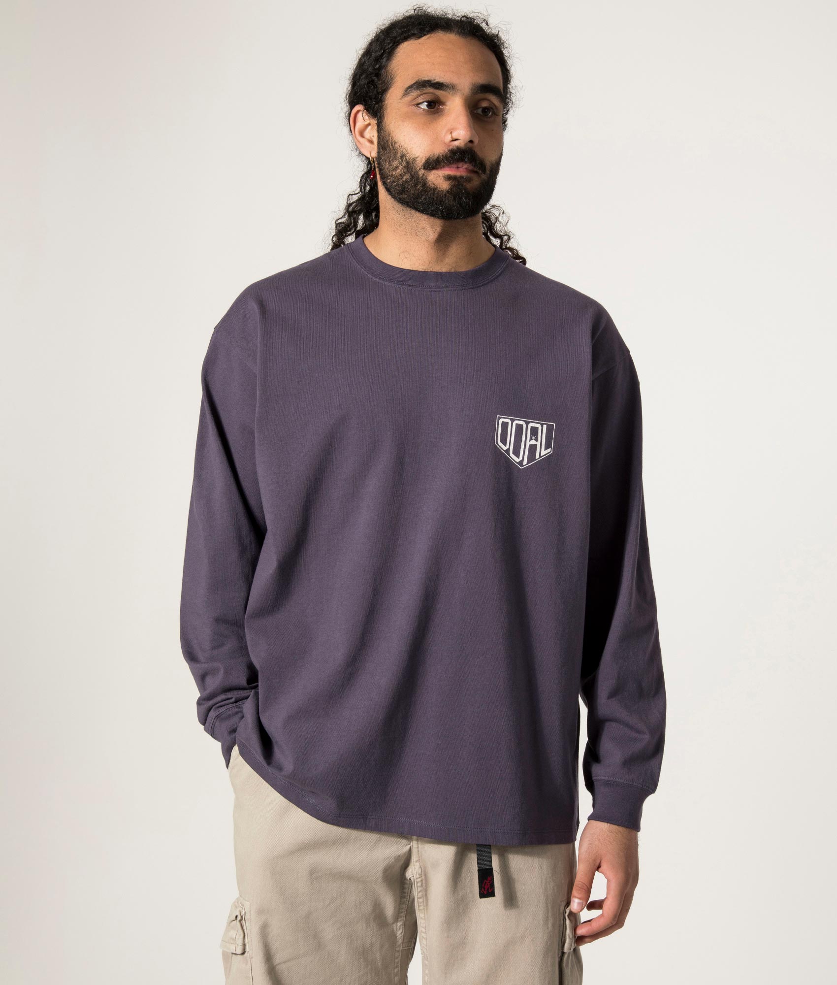 nanamica OOAL Long Sleeve Graphic T-Shirt in Vintage Navy at EQVVS. Front  Model Shot.