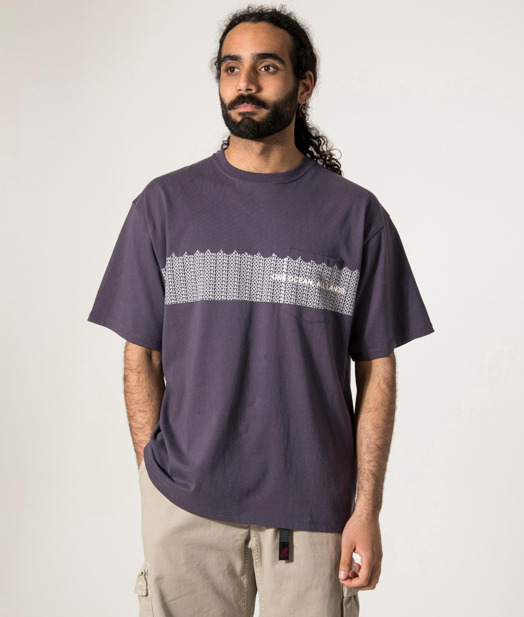 nanamica OOAL Graphic T-Shirt in Vintage Blue at EQVVS. Model Front Shot.