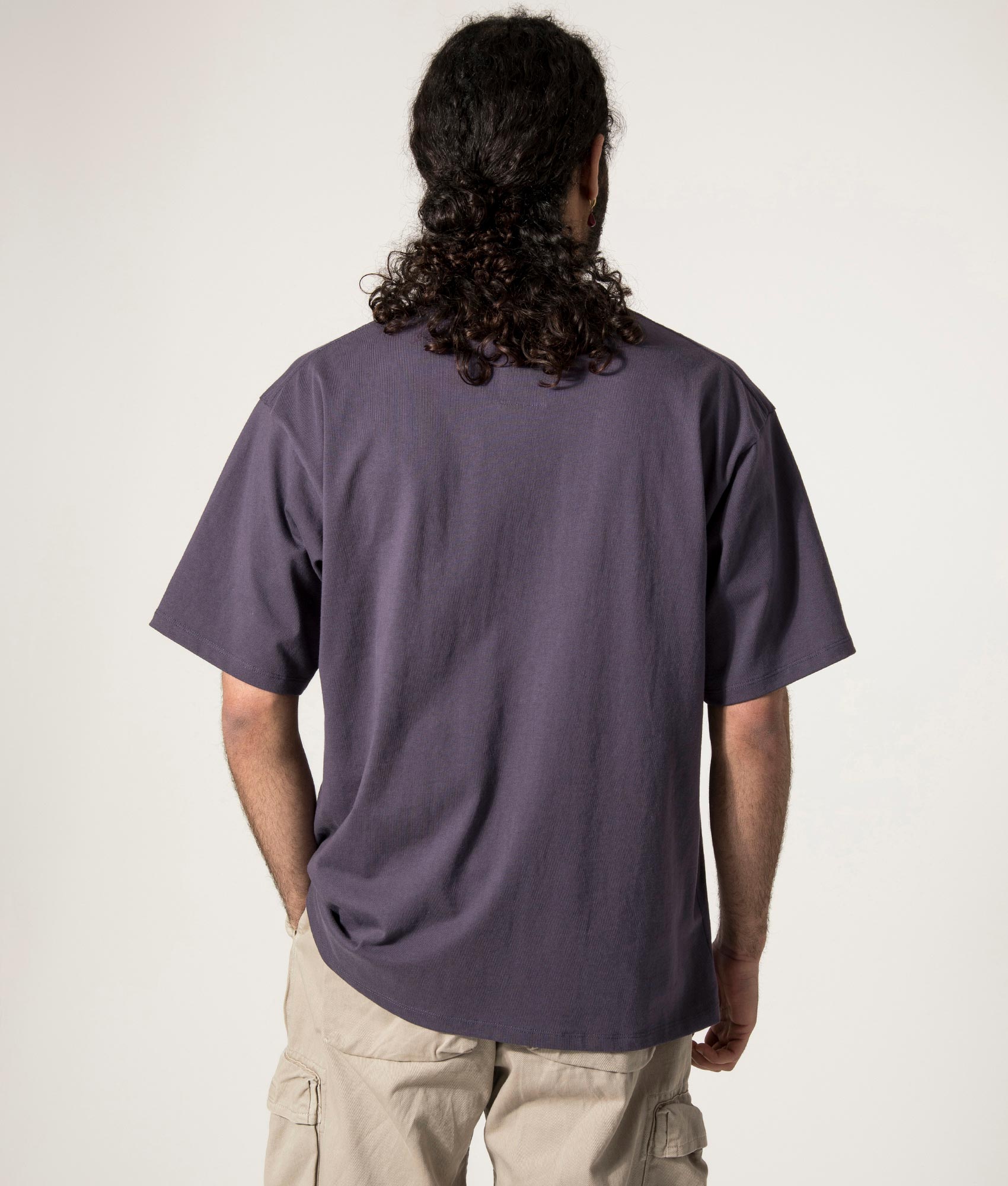 nanamica OOAL Graphic T-Shirt in Vintage Blue at EQVVS. Model Back Shot.