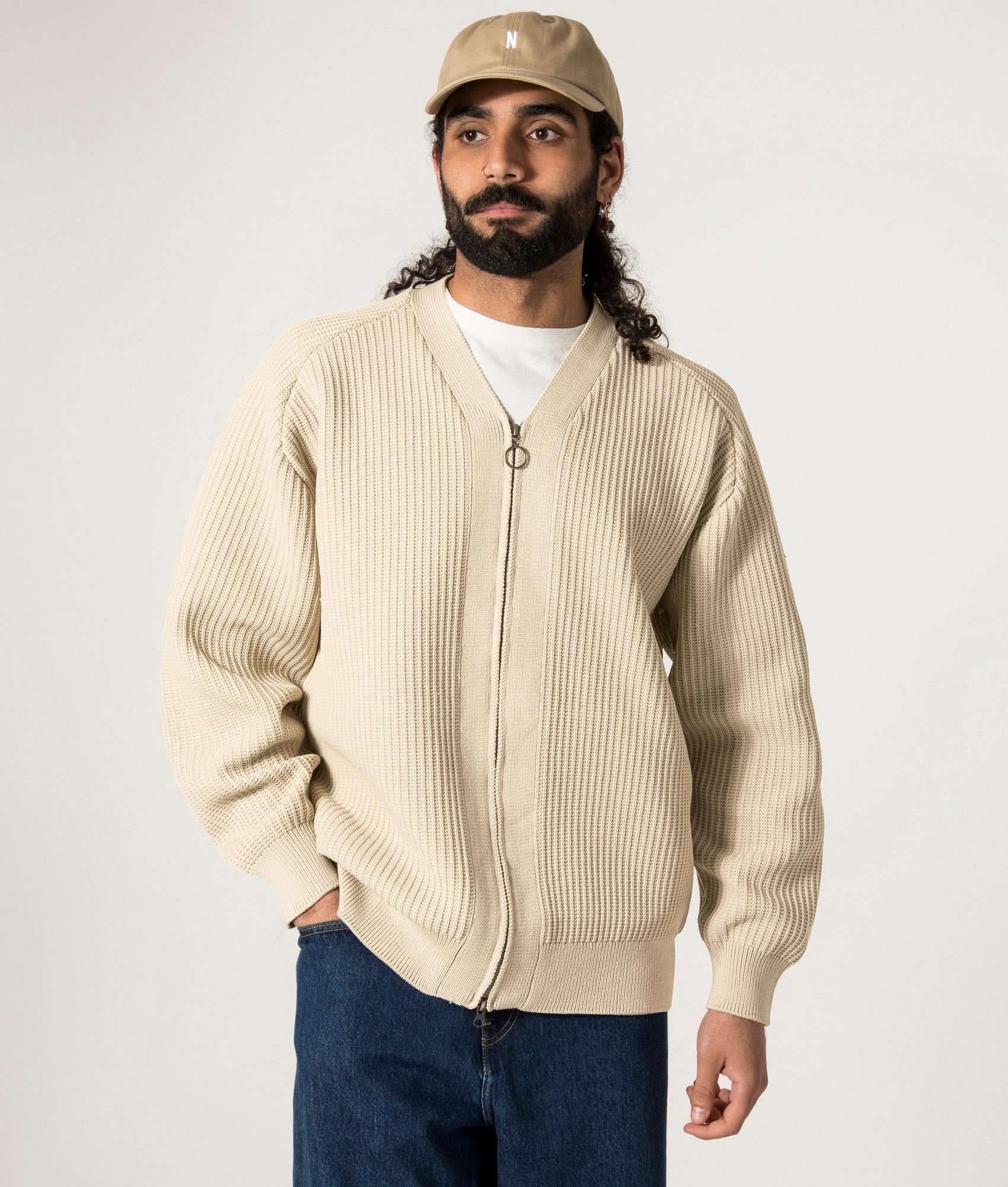 nanamica 5G Zip Through Cardigan in Ivory at EQVVS. Model Front Zip Up Shot.