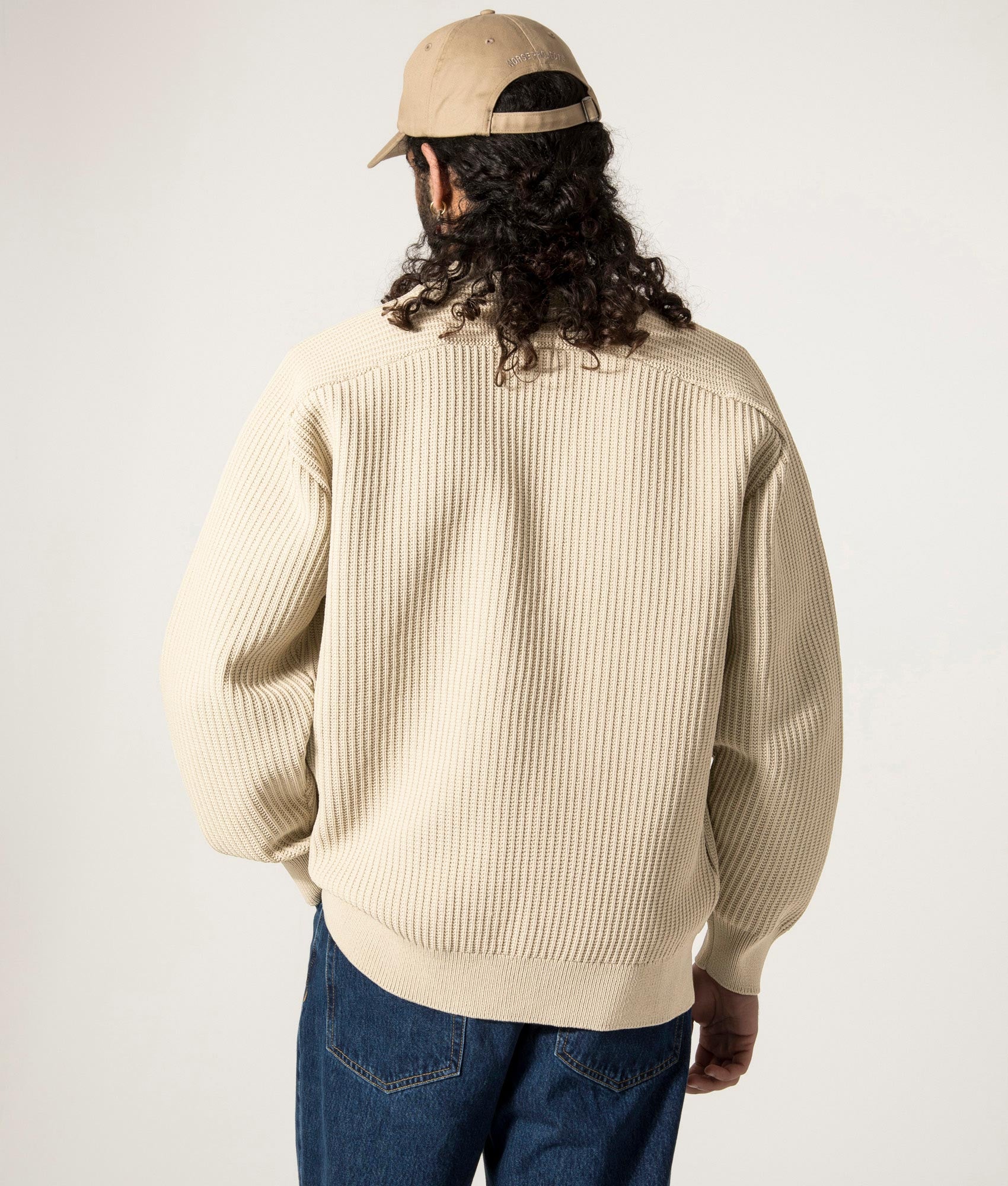 nanamica 5G Zip Through Cardigan in Ivory at EQVVS. Model Back Shot.