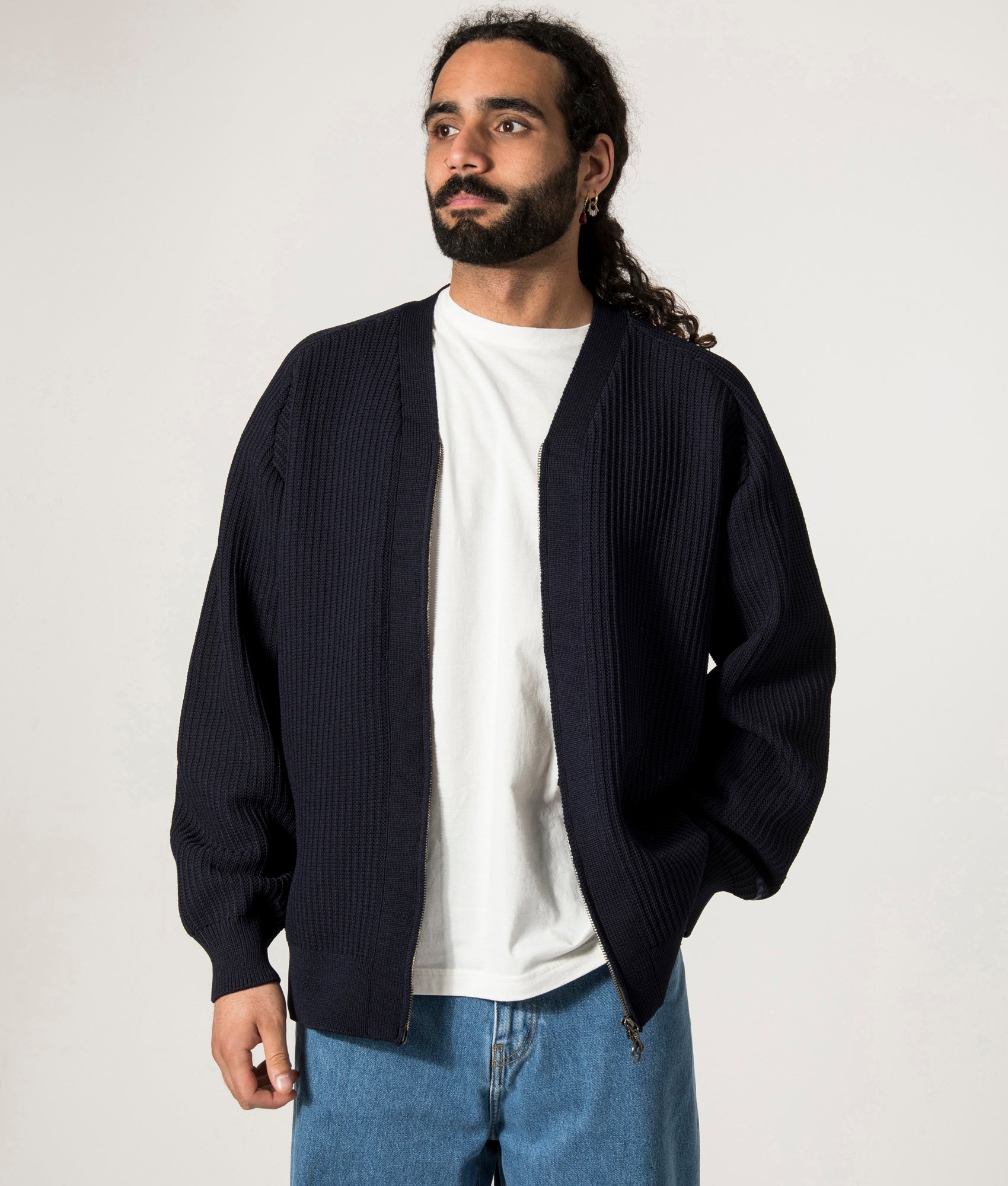 nanamica 5G Zip Through Cardigan in Navy Blue at EQVVS. Model Front Shot.