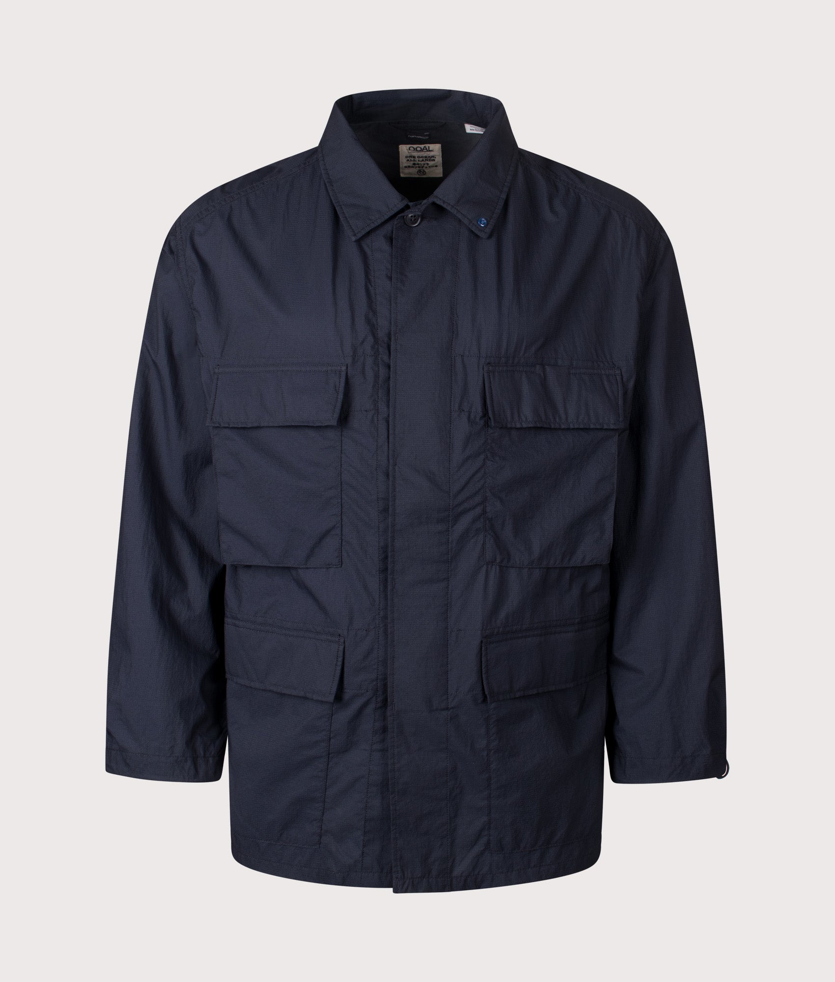 Nanamica Light Weight Field Jacket in Dark Navy at EQVVS Menswear. Front shot.
