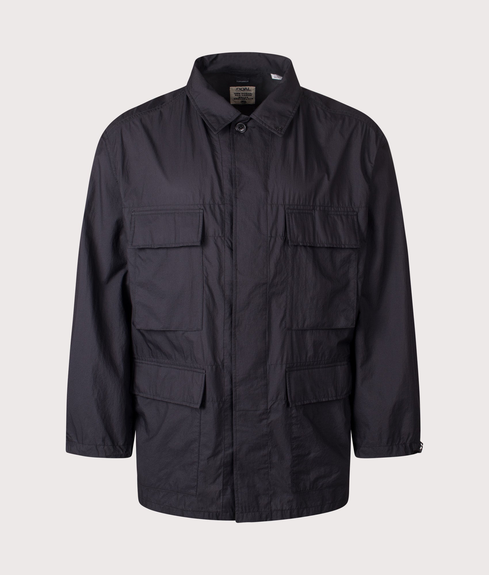 Nanamica Light Weight Field Jacket in Black at EQVVS Menswear. Front shot.