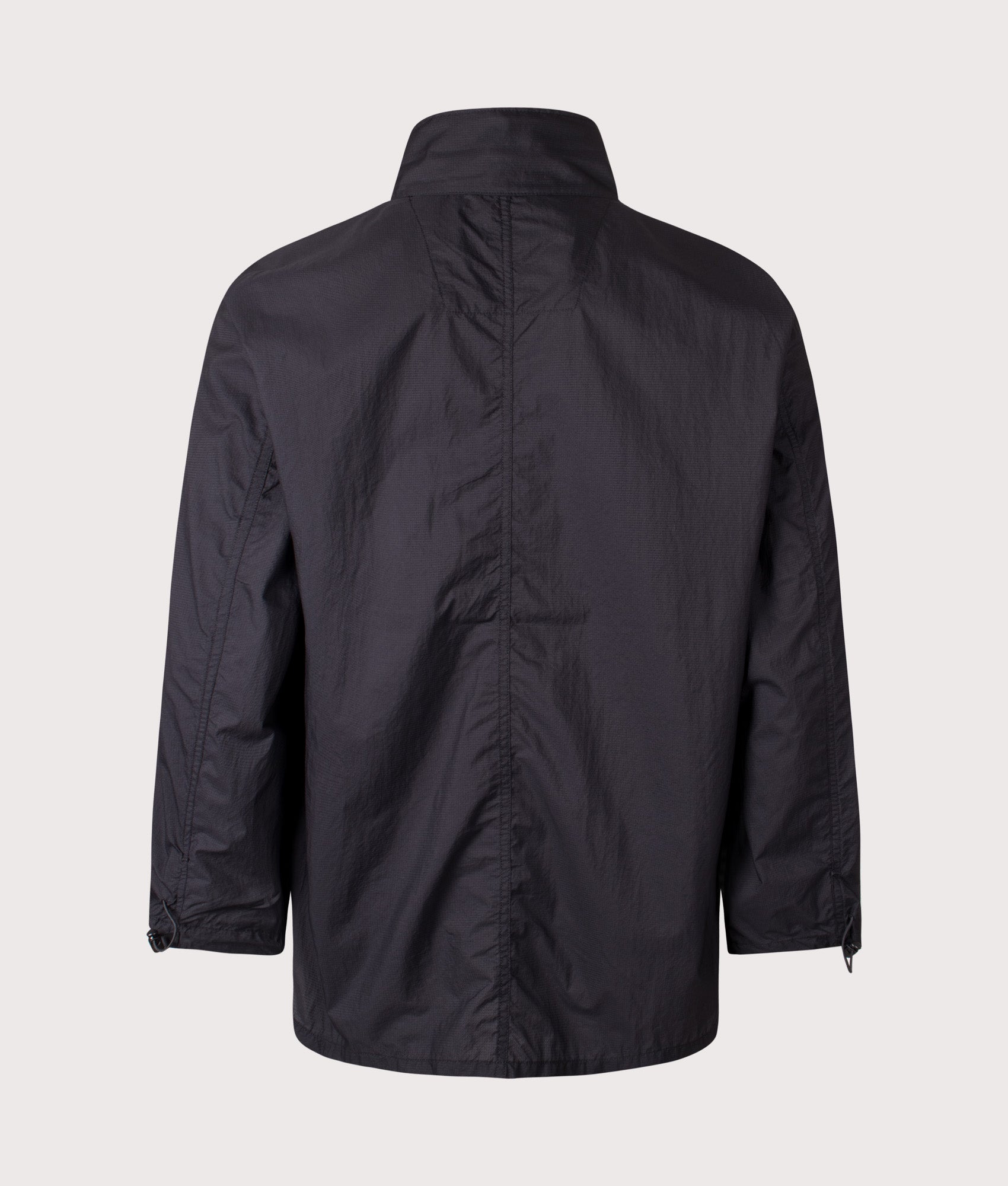 Nanamica Light Weight Field Jacket in Black at EQVVS Menswear. Back shot.