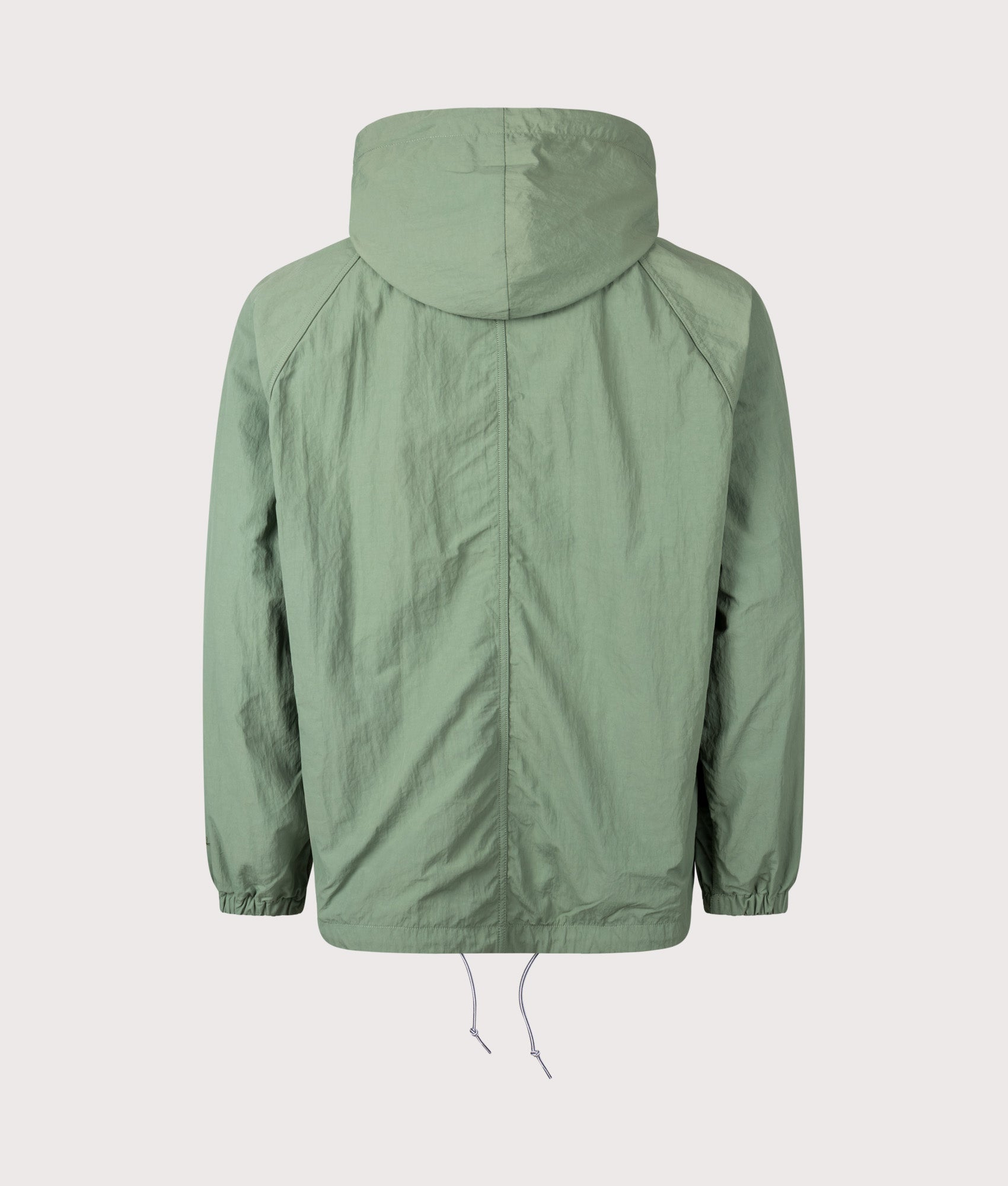 Nanamica Reversible Hooded Jacket in Fade Green at EQVVS Menswear. Back shot.