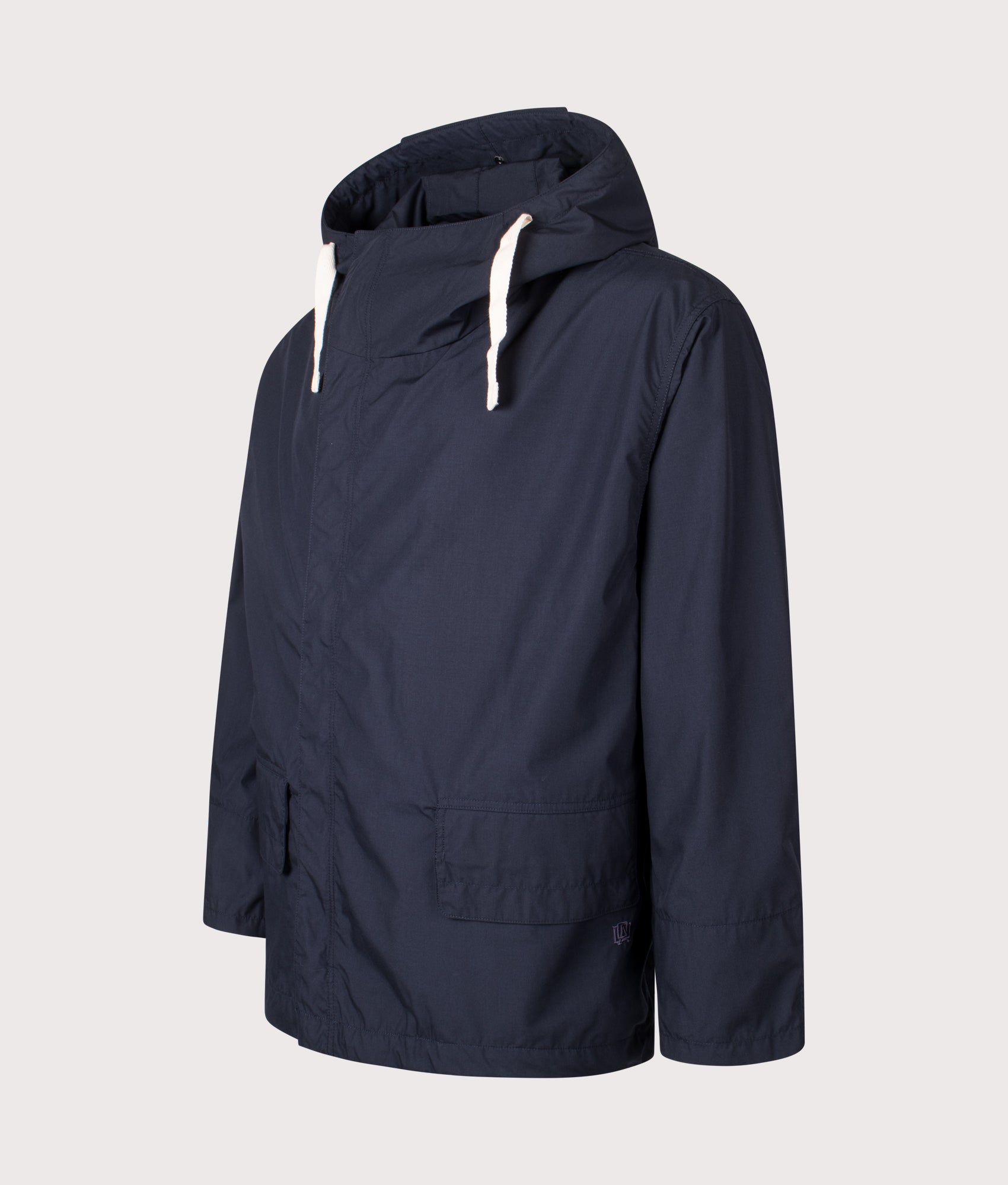 Nanamica Hooded Deck jacket in Navy at EQVVS Menswear. Angled front shot.
