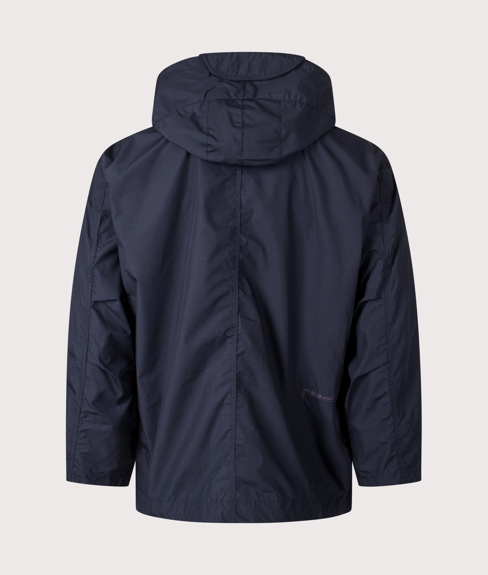 Nanamica Hooded Deck jacket in Navy at EQVVS Menswear. Back shot.