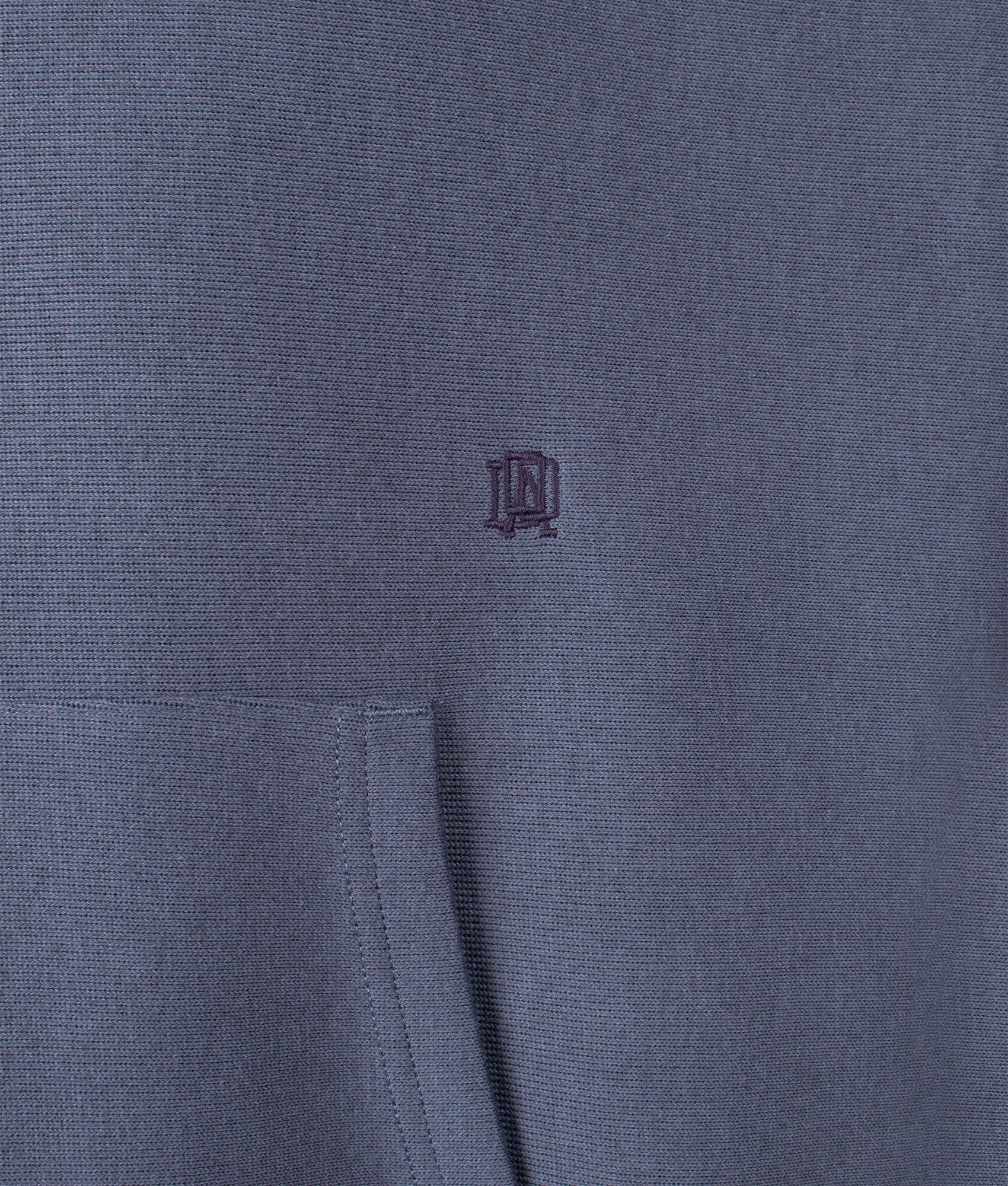 Nanamica Pullover sweat hoodie in Heather Navy at EQVVS Menswear. Detail shot.