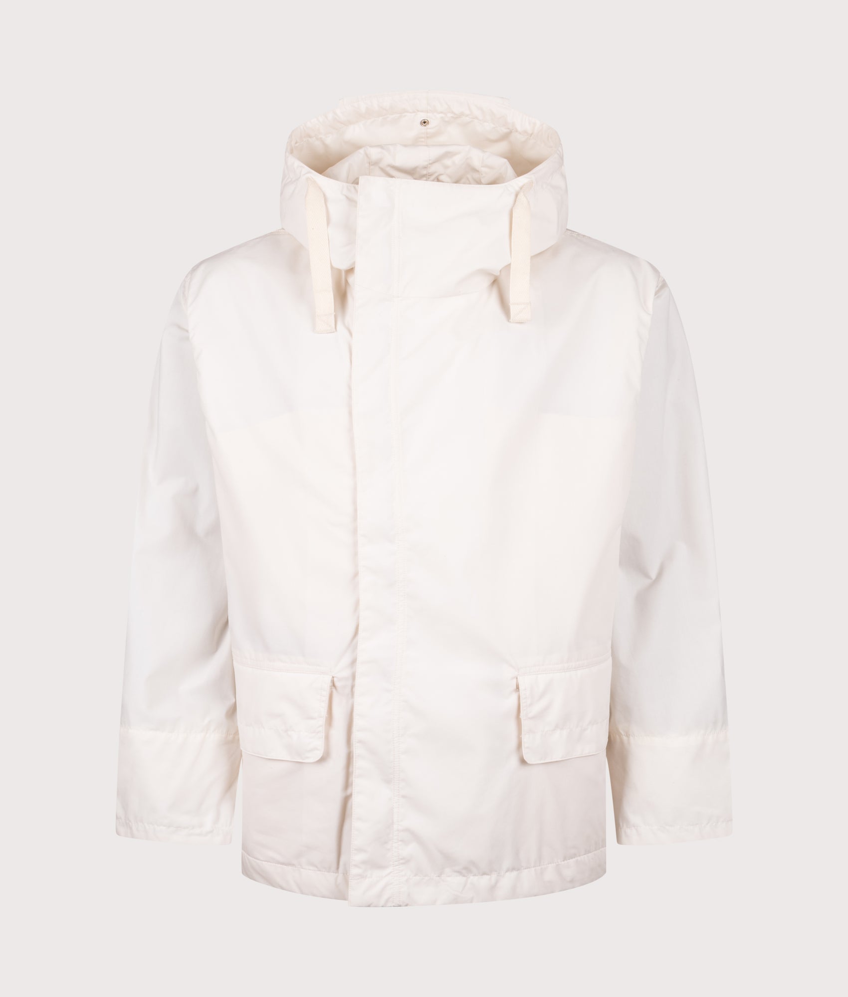 Nanamica Hooded Deck jacket in Off White at EQVVS Menswear. Front shot.