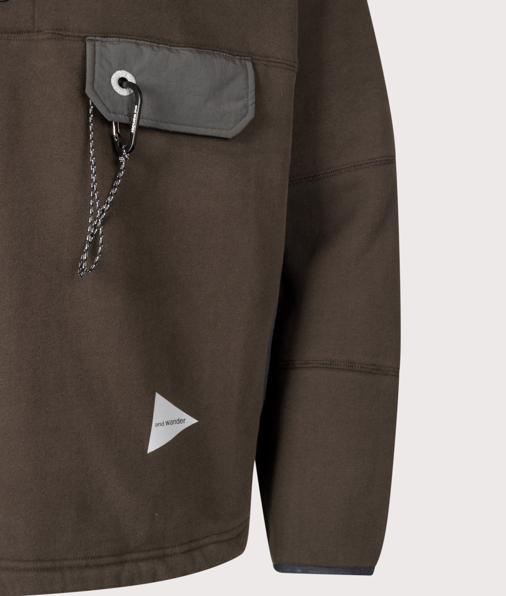 and wander Relaxed Fit Button Placket Overhead Sweatshirt in Dark Brown at EQVVS Menswear. Detail shot.