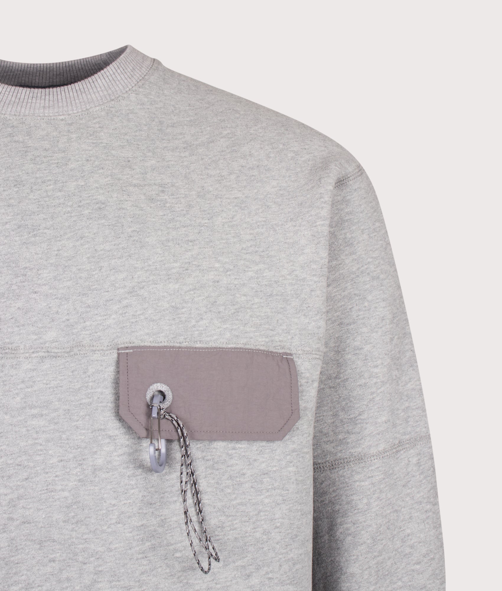and wander Relaxed Fit Pocket Sweatshirt in Light Grey at EQVVS Menswear. Detail shot.