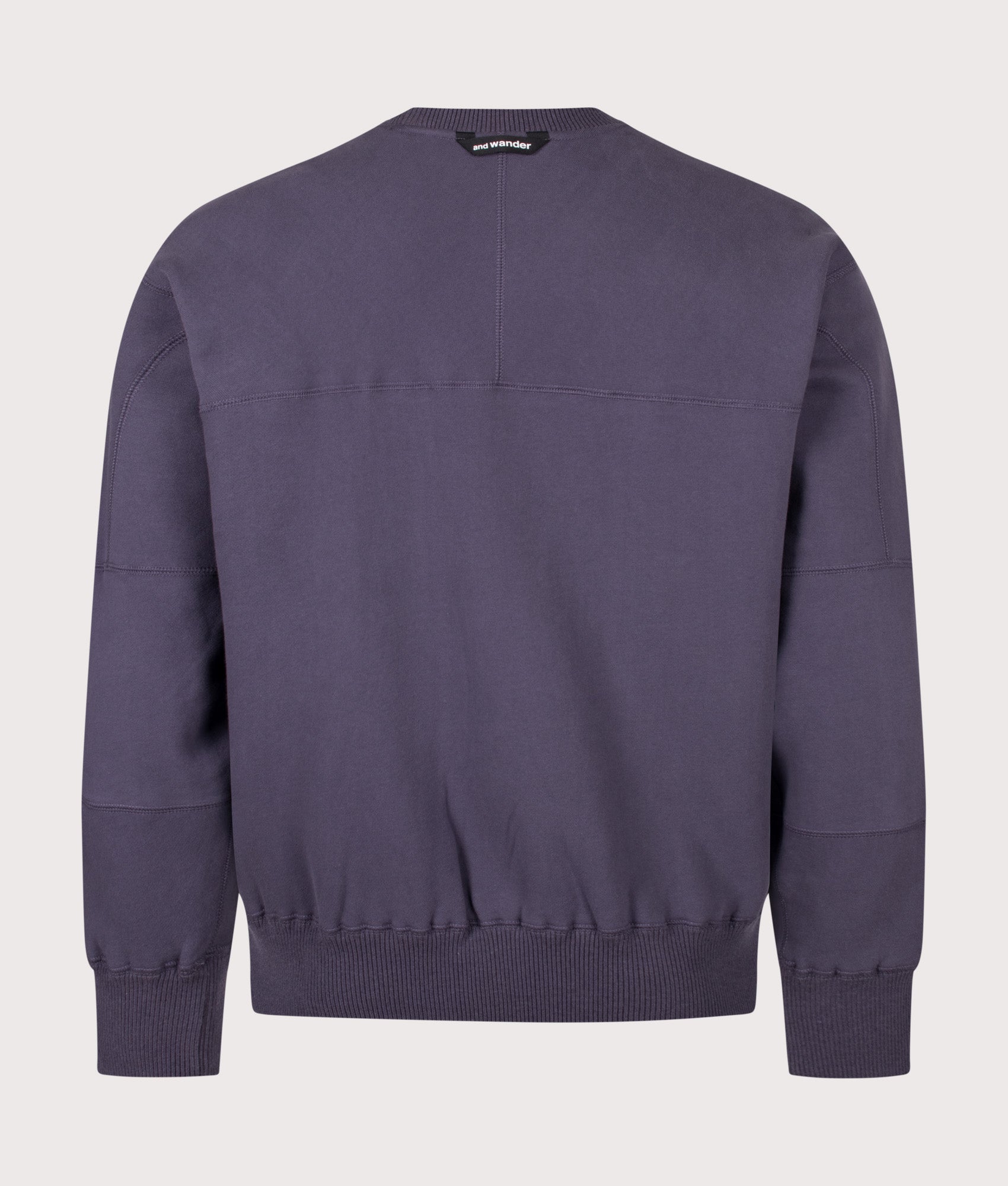 and wander Relaxed Fit Pocket Sweatshirt in Purple at EQVVS Menswear. Back shot.
