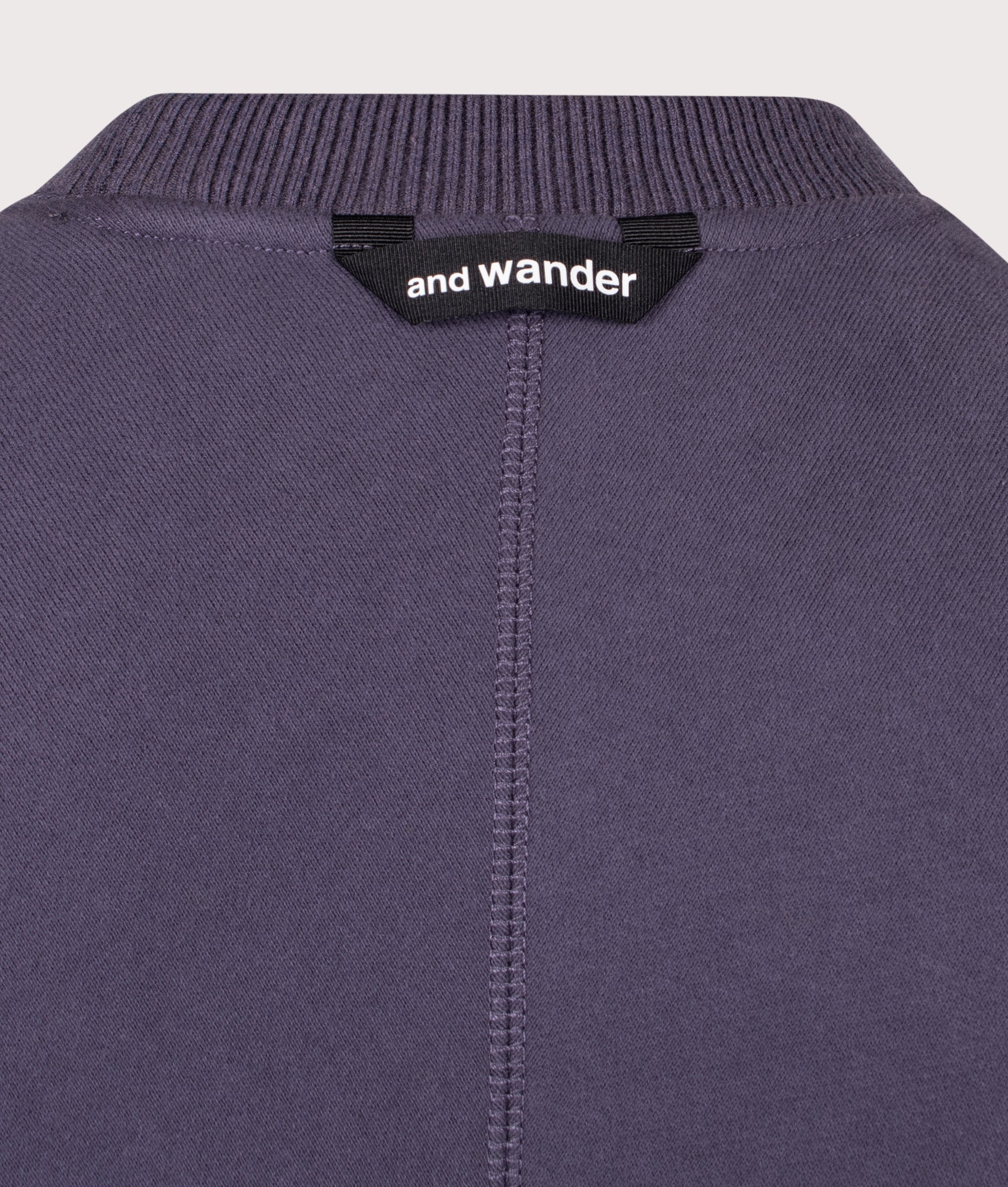 and wander Relaxed Fit Pocket Sweatshirt in Purple at EQVVS Menswear. Detail shot.