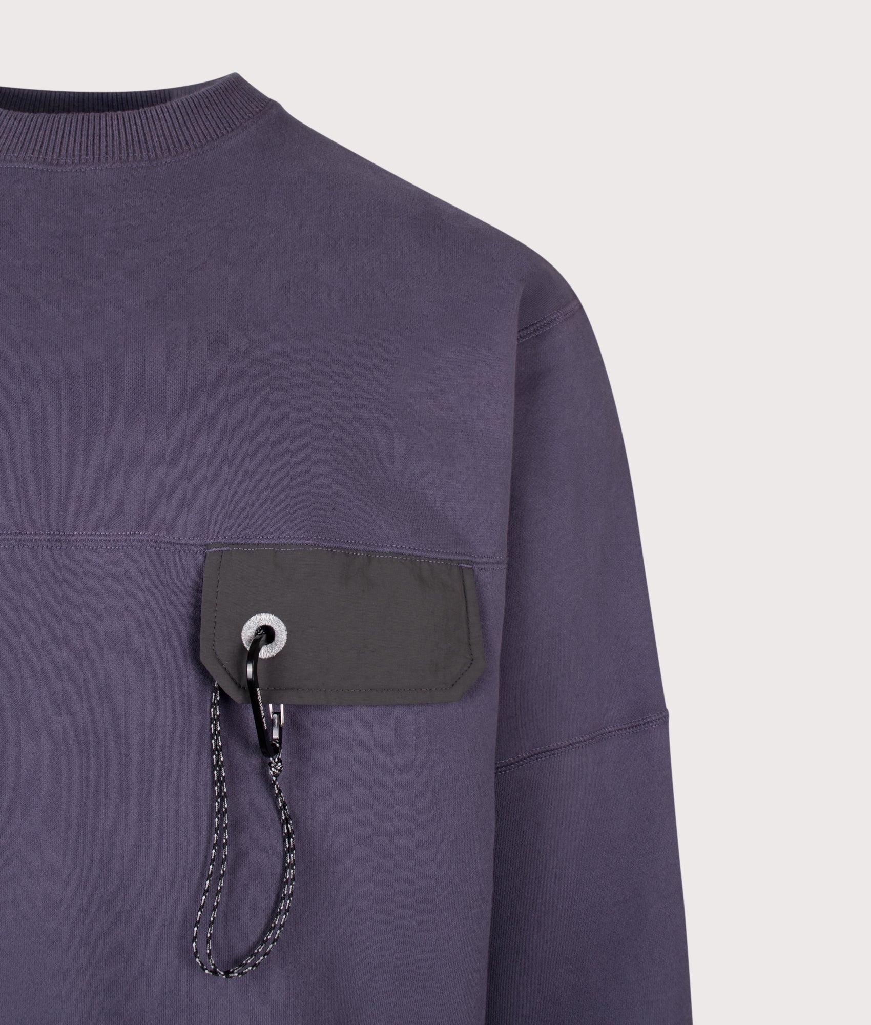 and wander Relaxed Fit Pocket Sweatshirt in Purple at EQVVS Menswear. Detail shot.