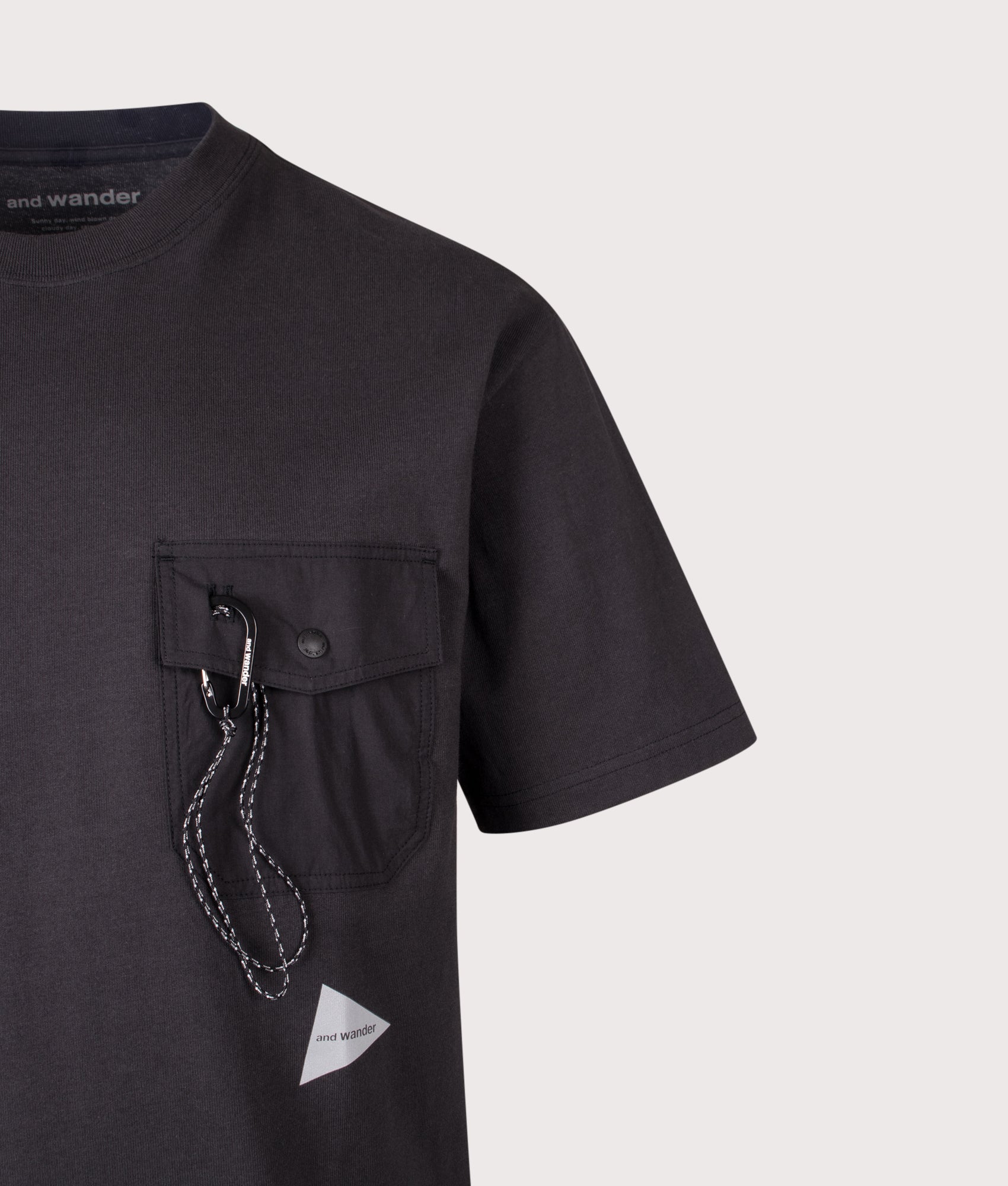 and wander Relaxed Fit Heavy Cotton Pocket T-Shirt in Black at EQVVS Menswear. Detail shot.