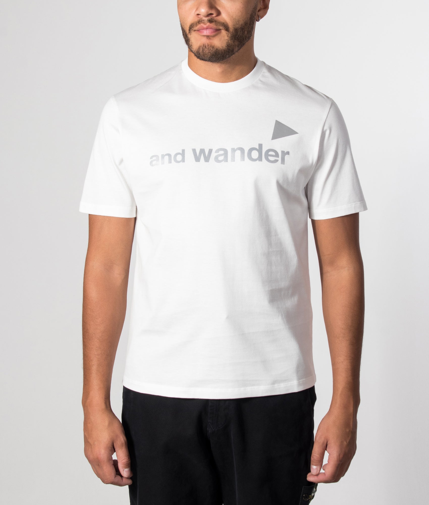 and wander Regular Fit and wander Ref T-Shirt in White at EQVVS Menswear. Model front shot.
