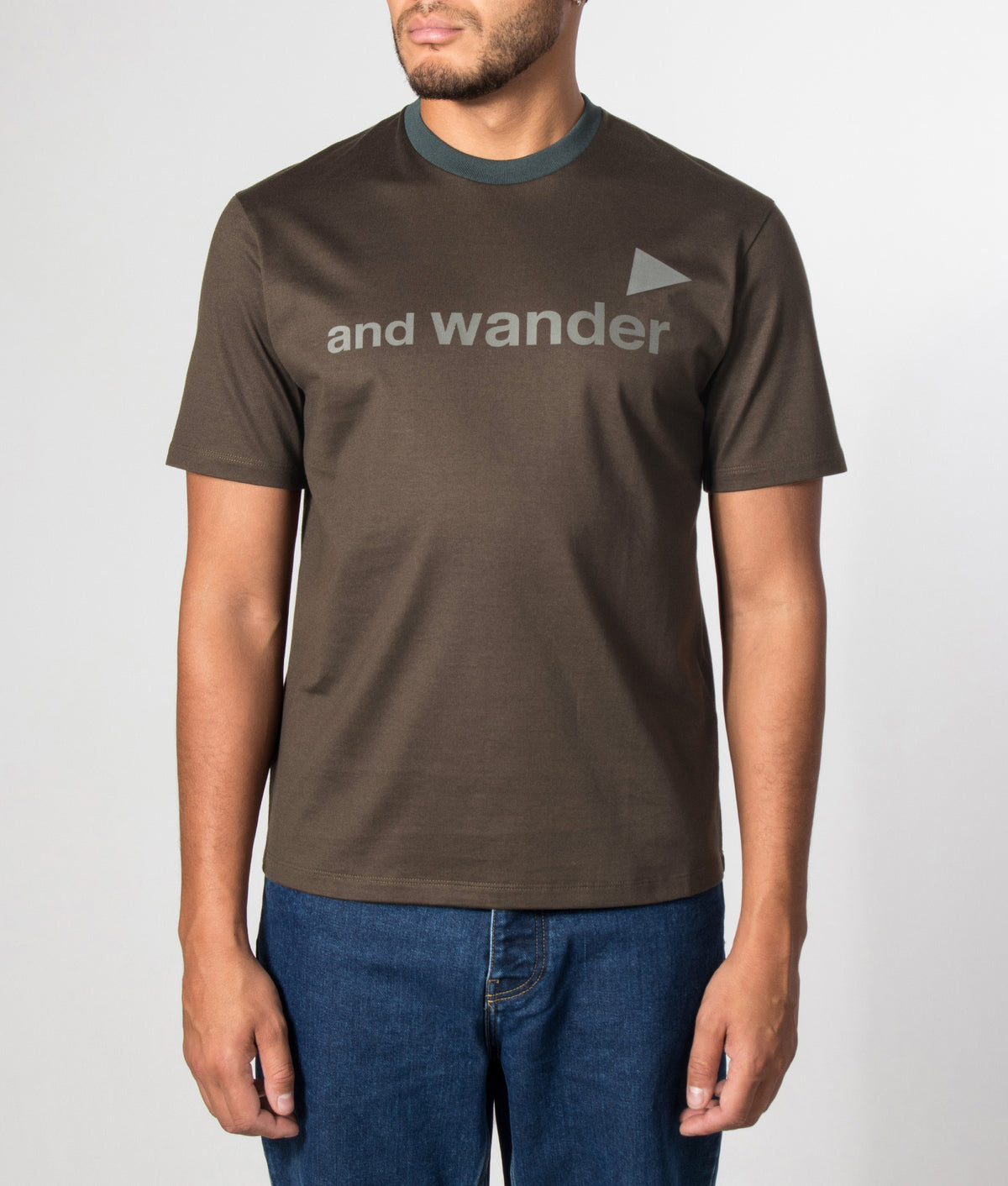 and wander Regular Fit and wander Ref T-Shirt in Dark Khaki at EQVVS Menswear. Model front shot.