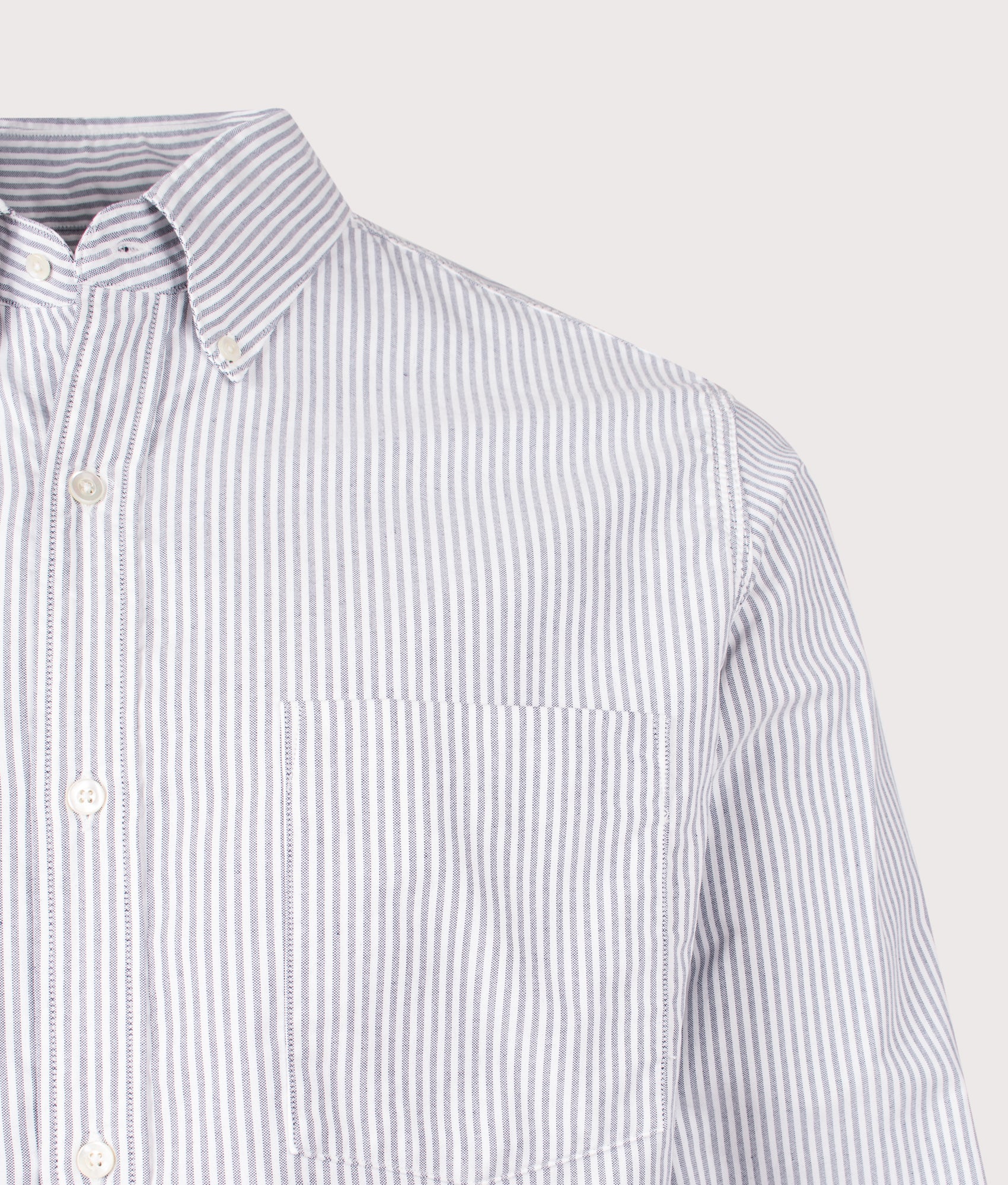 nanamica Relaxed Fit Button Down Stripe Wind Shirt in Navy at EQVVS Menswear. Detail shot.