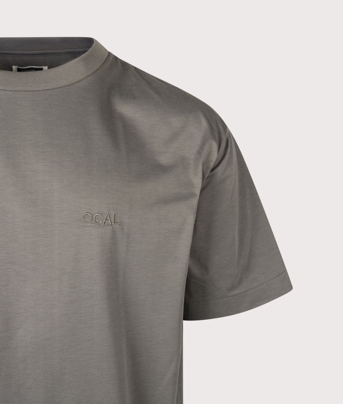 nanamica Oversized OOAL Polyester Jersey T-Shirt in Charcoal at EQVVS Menswear. Detail shot.