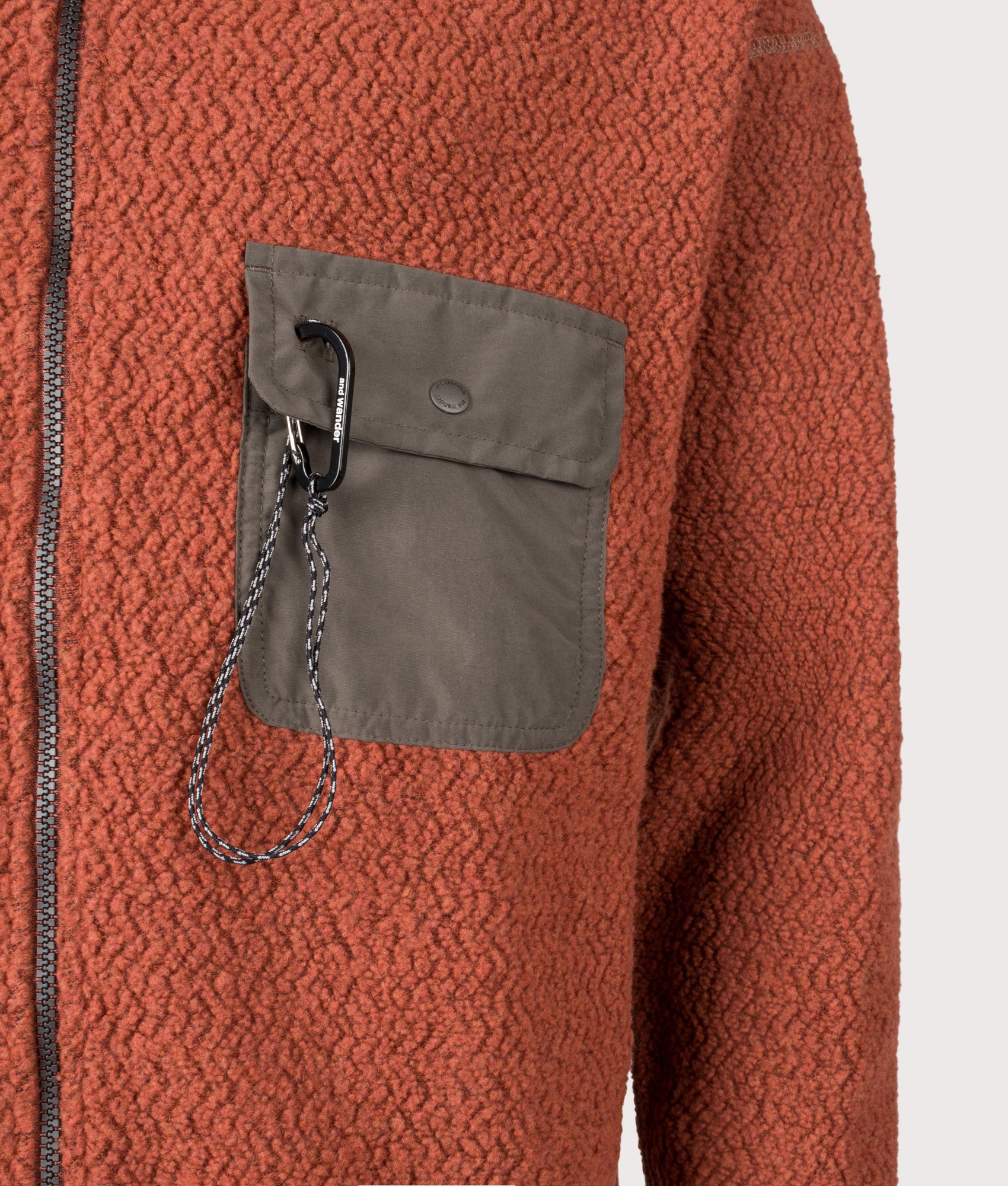 and wander Re Wool JQ Stand Zip Sweatshirt in Red at EQVVS Menswear. Detail shot.