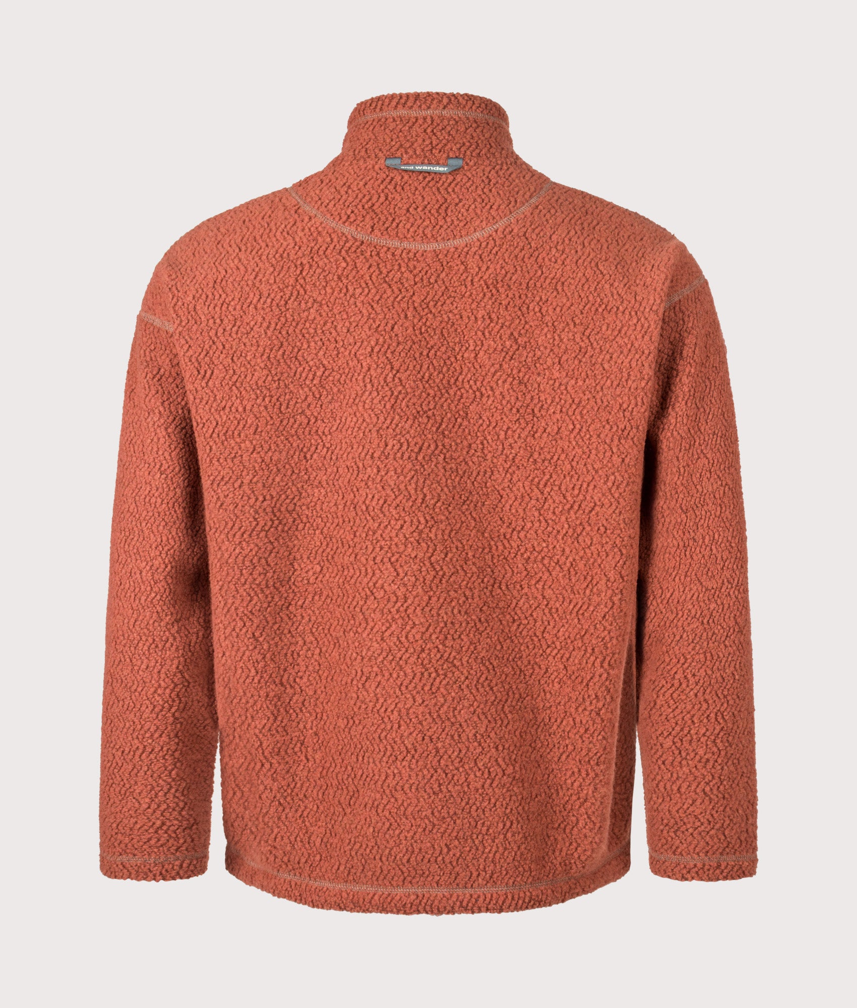 and wander Re Wool JQ Stand Zip Sweatshirt in Red at EQVVS Menswear. Back shot.