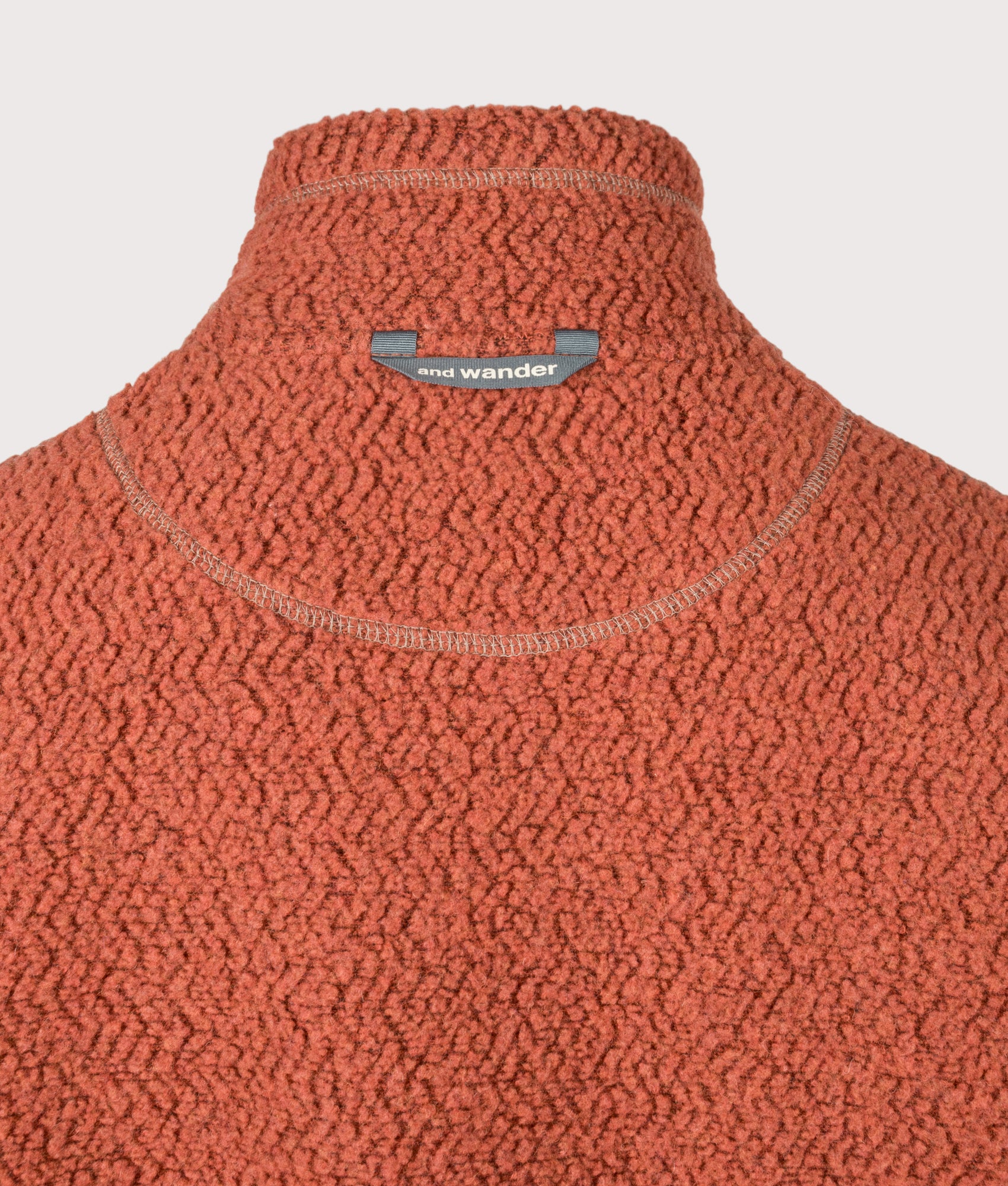 and wander Re Wool JQ Stand Zip Sweatshirt in Red at EQVVS Menswear. Back detail shot.