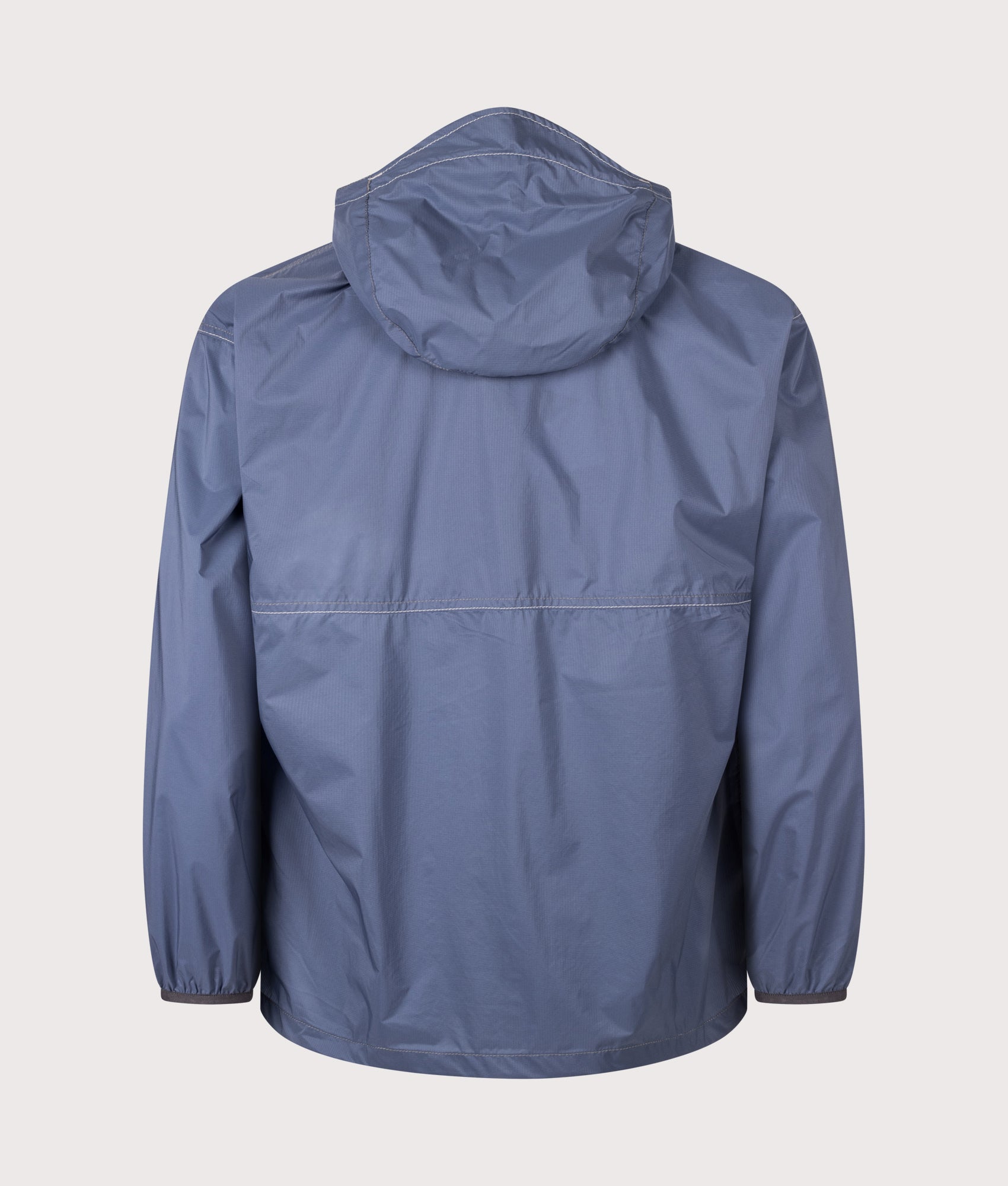 and wander Regular Fit Pertex Wind Jacket in Indigo Blue at EQVVS Menswear. Back shot.