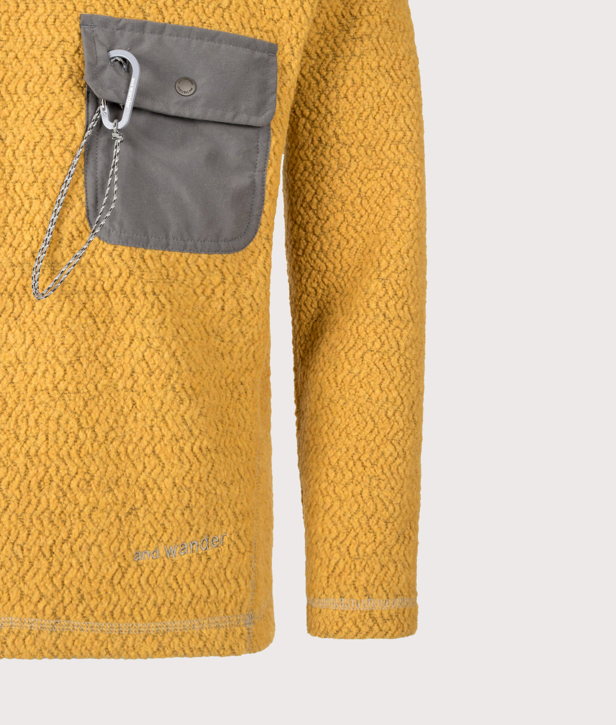 and wander Relaxed fit Re wool JQ Crew Neck Jumper in Yellow at EQVVS Menswear. Detail shot.