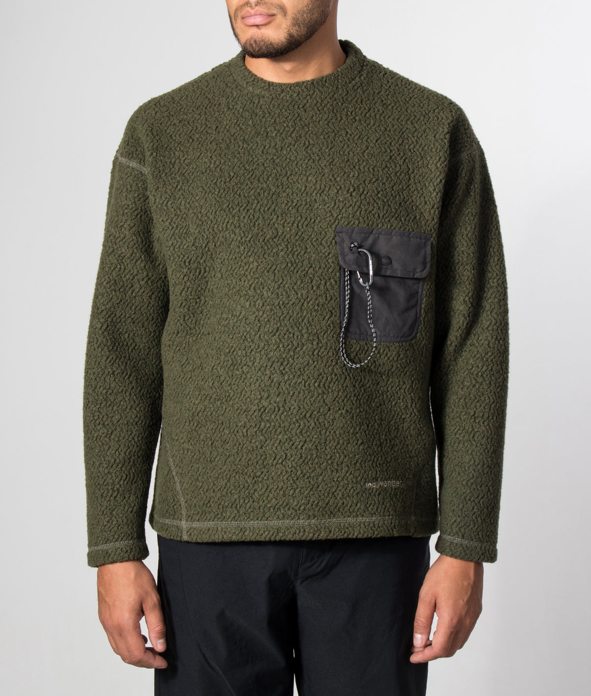 and wander Relaxed fit Re wool JQ Crew Neck Jumper season in Khaki at EQVVS Menswear. Model front shot.