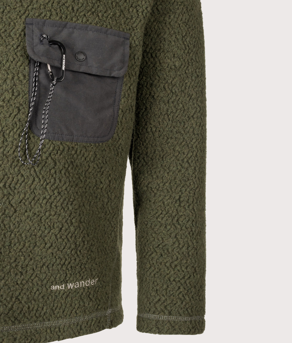 and wander Relaxed fit Re wool JQ Crew Neck Jumper season in Khaki at EQVVS Menswear. Detail shot.