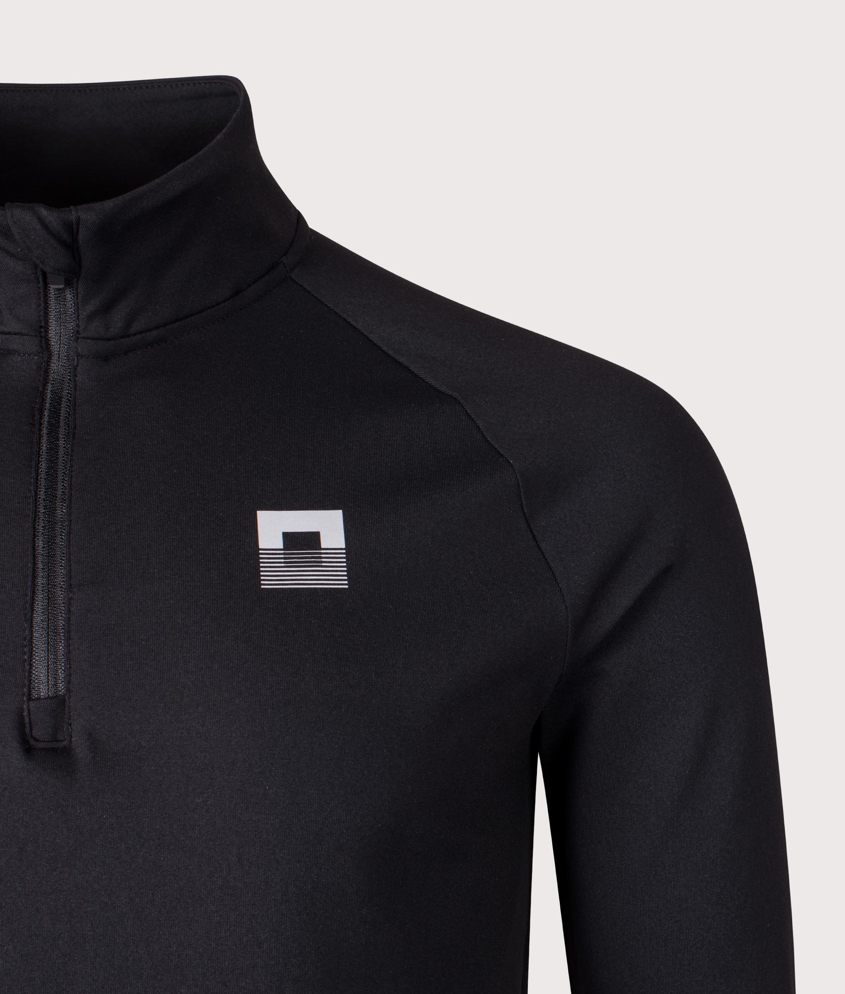 Dynamic Pro Quarter Zip Track Top. Shot by EQVVS. Front detail shot.