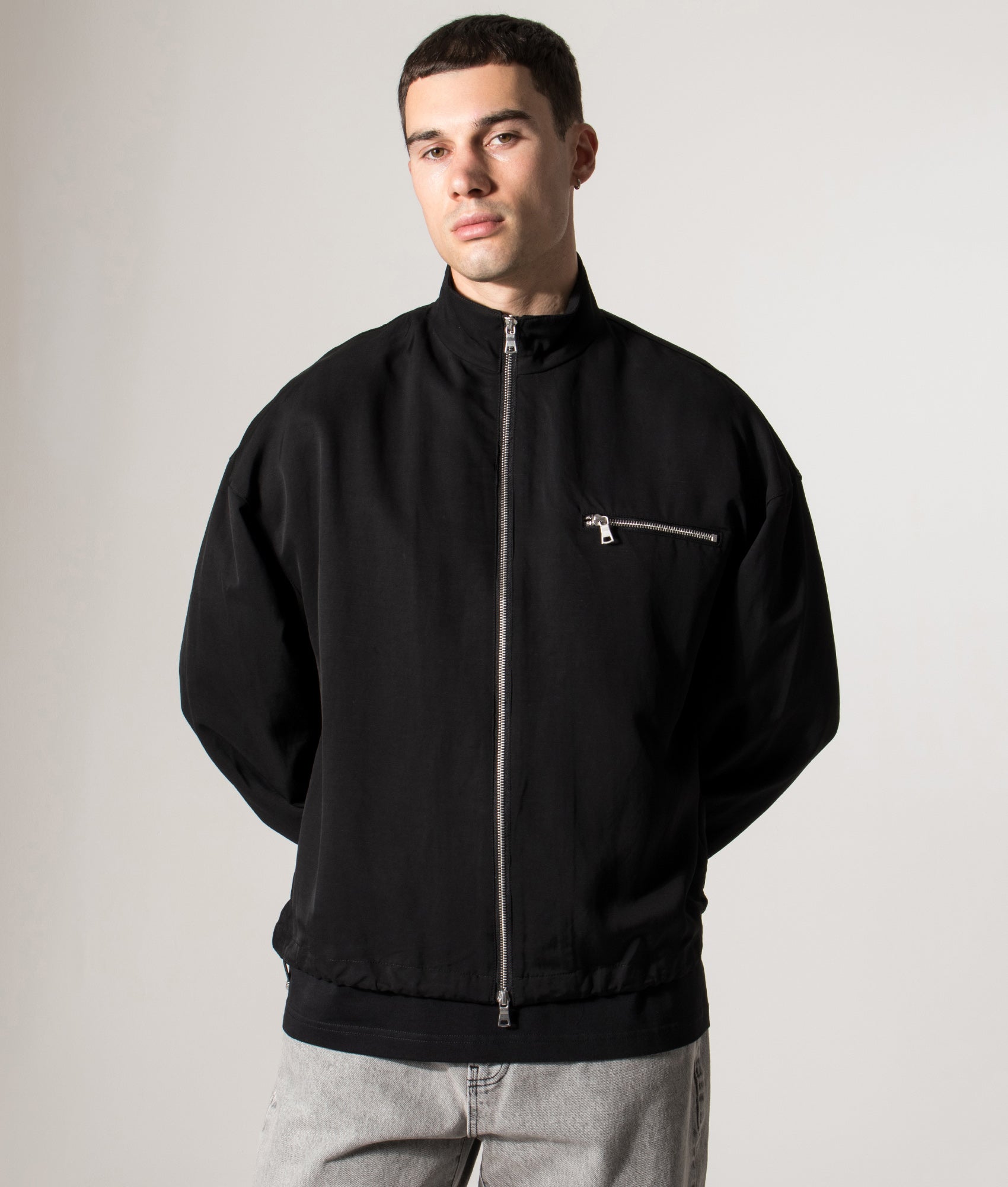 Viscose Linen Track Jacket. Shot by EQVVS. Model front angled shot.