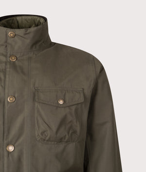 Ogston Waterproof Jacket in Olive | Barbour Lifestyle | Shot at EQVVS | Front detail shot 