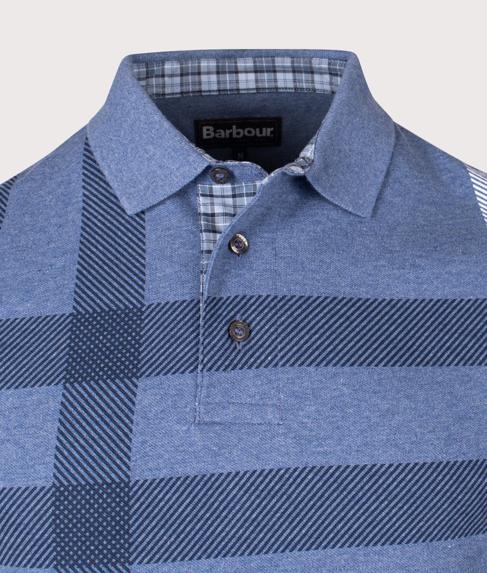 Barbour Blaine Tailored Polo Shirt in Chambray at EQVVS Menswear. Detail shot.