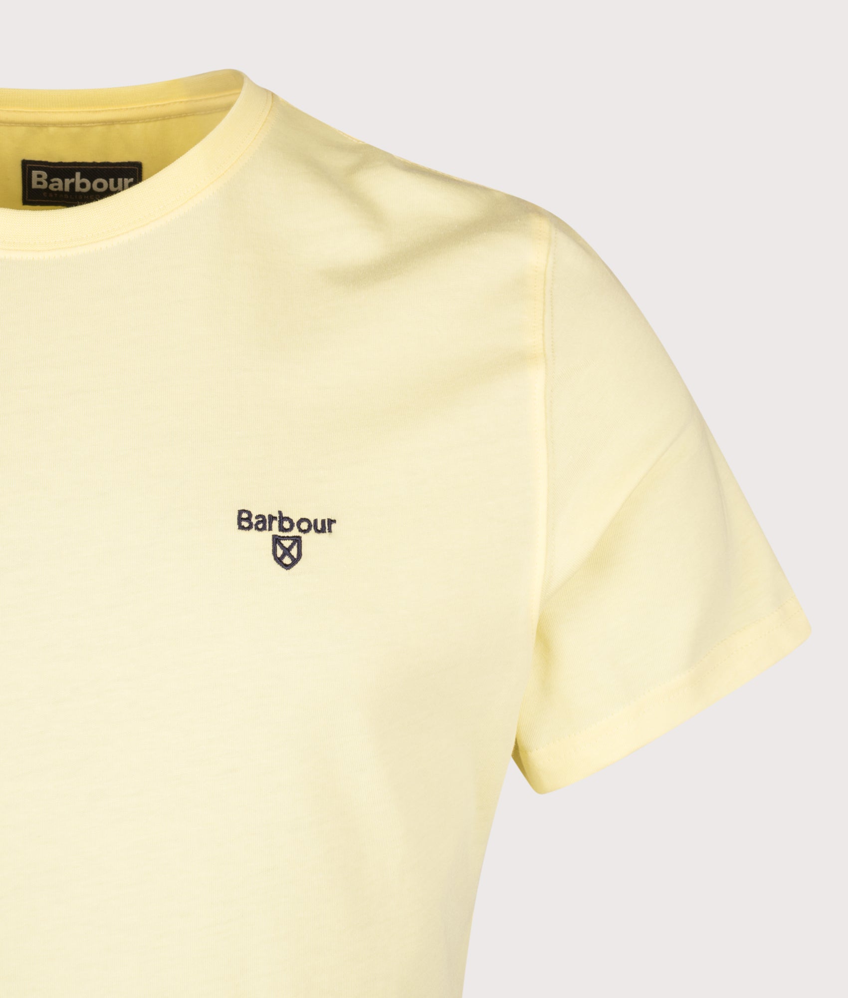 Barbour Essential Sports T-Shirt in Heritage Lemon at EQVVS Menswear. Detail shot.