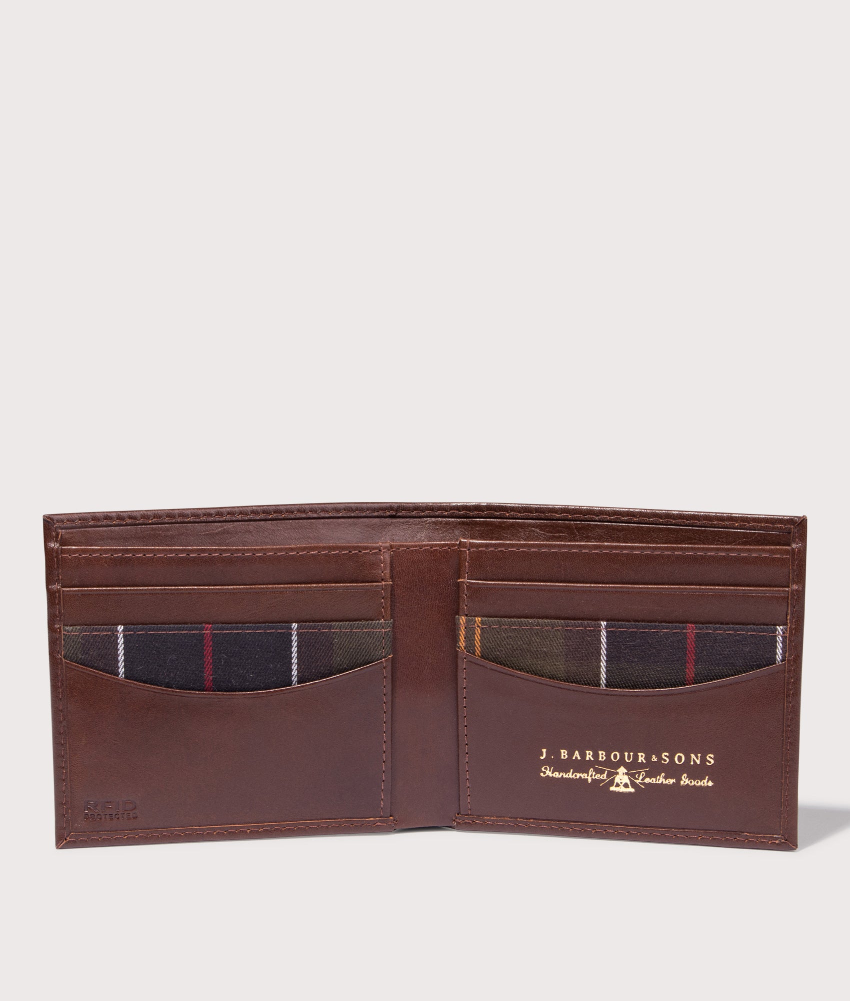 Colwell Leather Billfold Wallet by Barbour in Black/Classic. Shot by EQVVS. Detail shot.